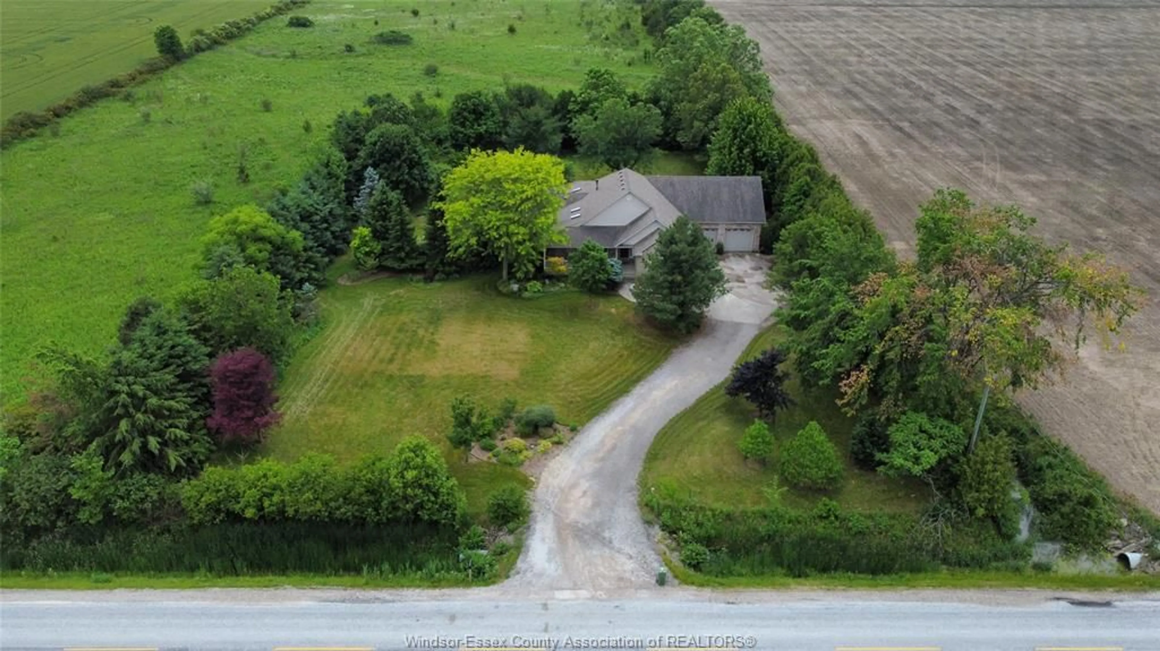 A pic from outside/outdoor area/front of a property/back of a property/a pic from drone, street for 1347 North Rear Rd, Lakeshore Ontario N0R 1A0