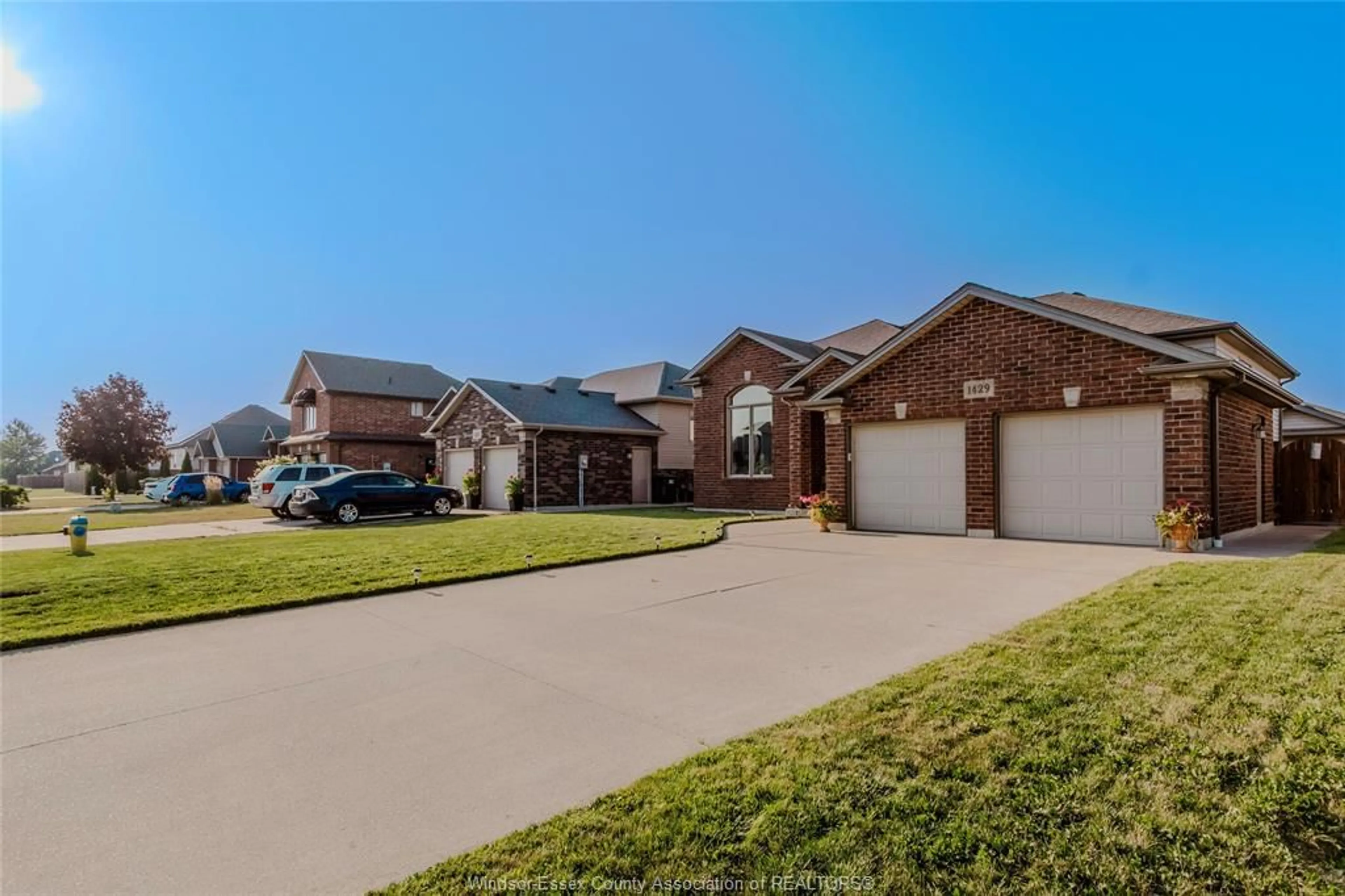 Home with brick exterior material, street for 1429 OAKWOOD Ave, Lakeshore Ontario N0R 1A0