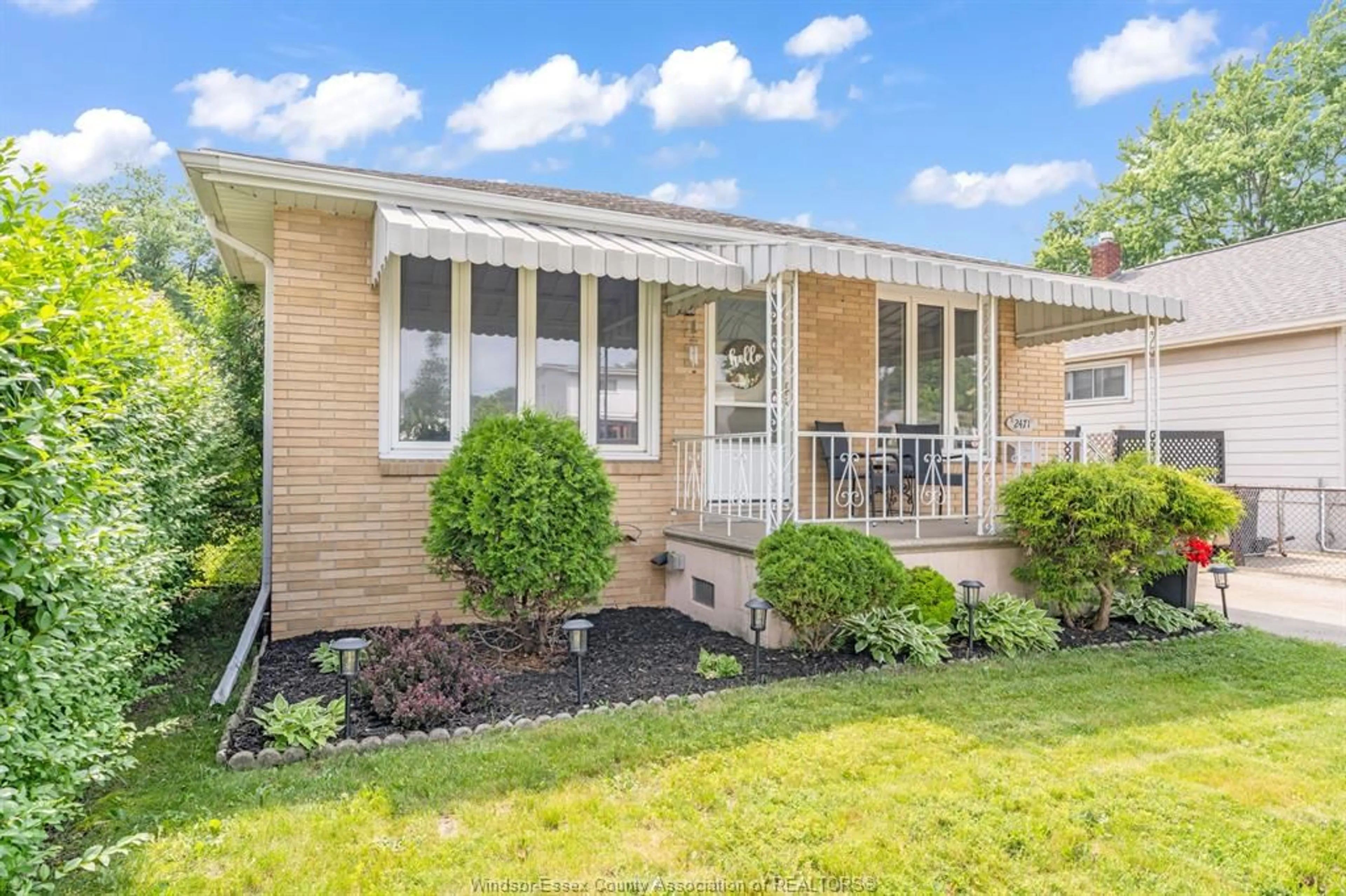 Home with vinyl exterior material, street for 2471 CHANDLER Rd, Windsor Ontario N8W 4A7
