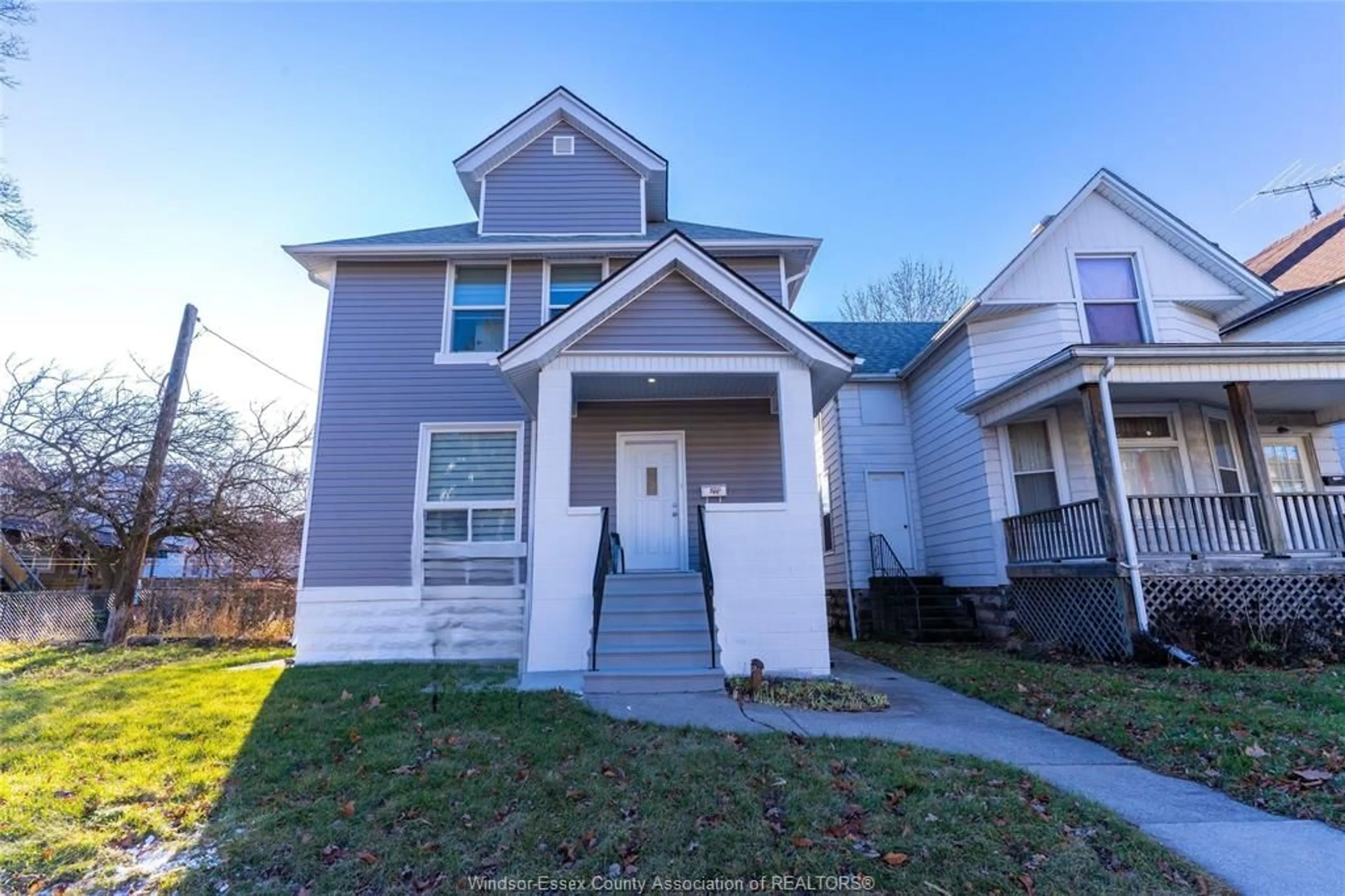 Home with vinyl exterior material, street for 765 DOUGALL Ave, Windsor Ontario N9A 4P9
