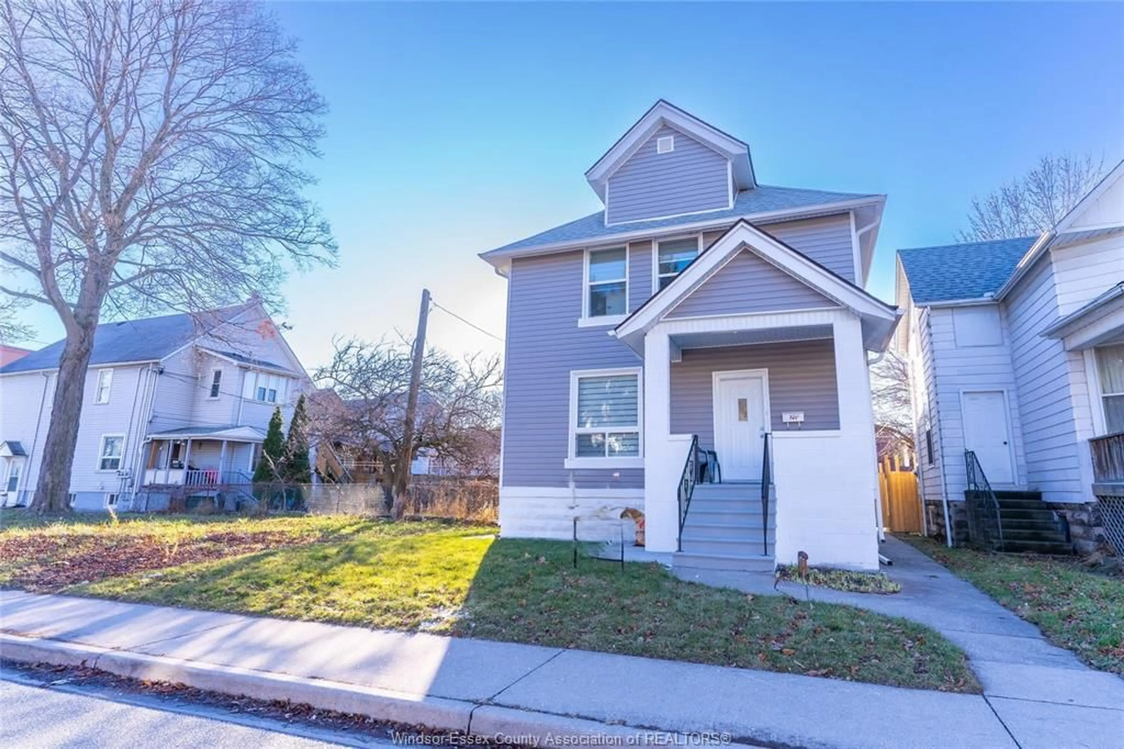 Home with vinyl exterior material, street for 765 DOUGALL Ave, Windsor Ontario N9A 4P9