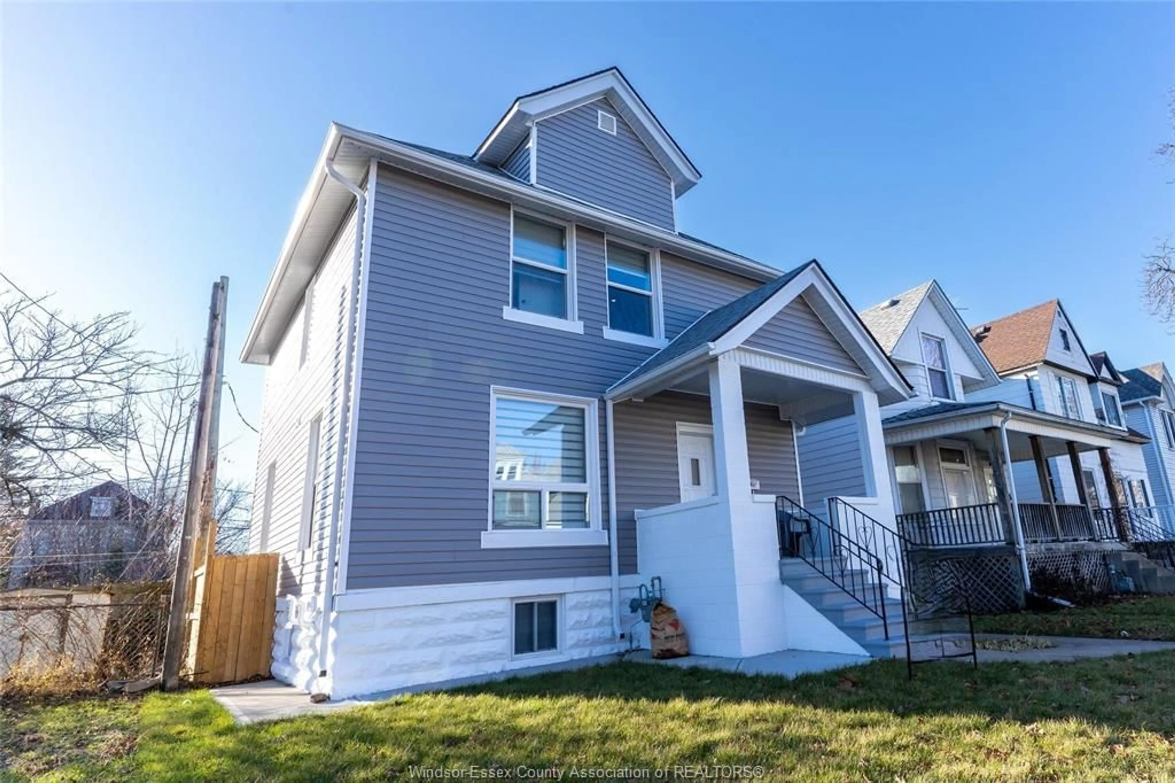 Home with vinyl exterior material, street for 765 DOUGALL Ave, Windsor Ontario N9A 4P9