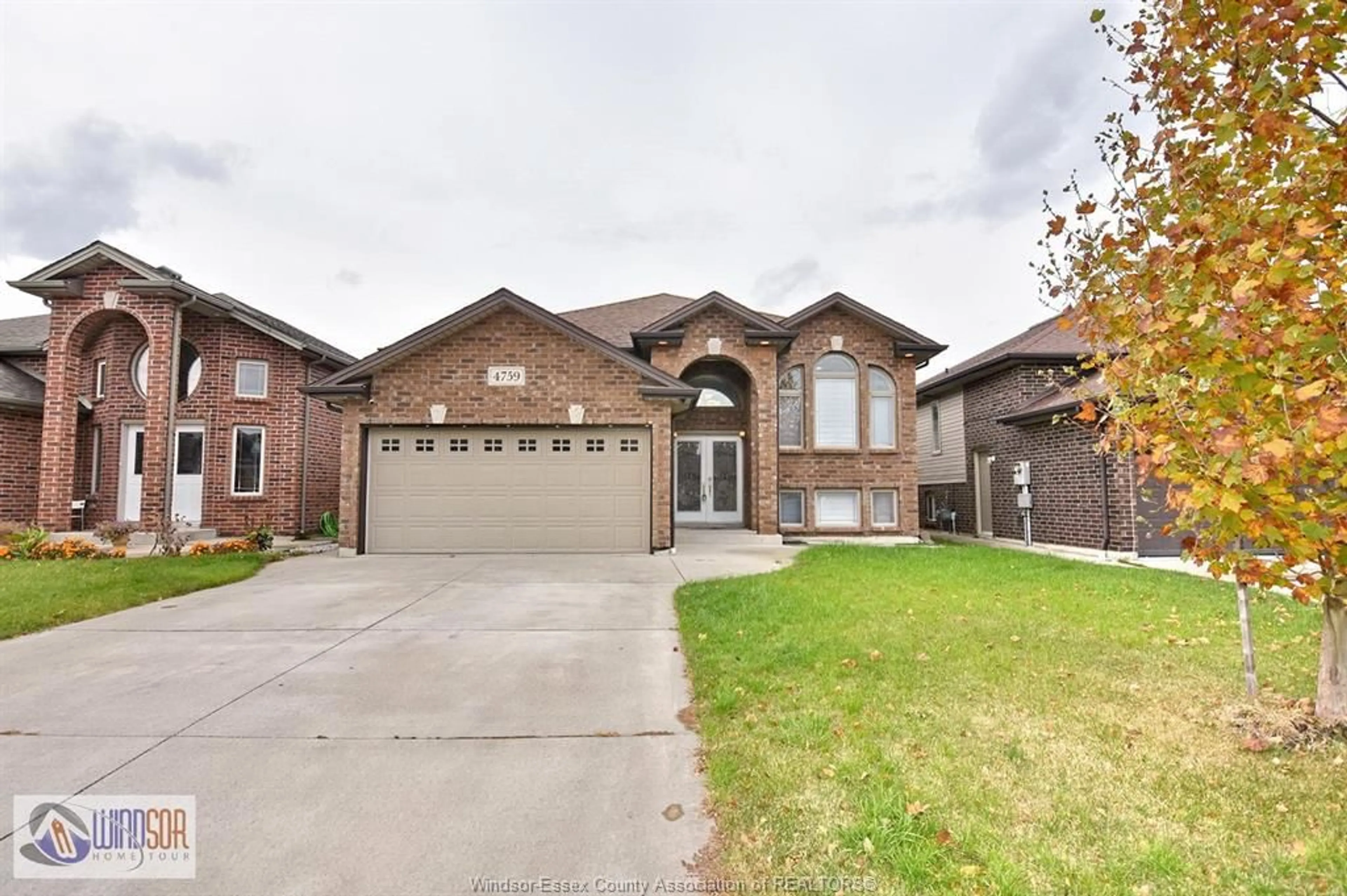 Home with brick exterior material, street for 4579 PERIWINKLE Cres, Windsor Ontario N9G 3G8