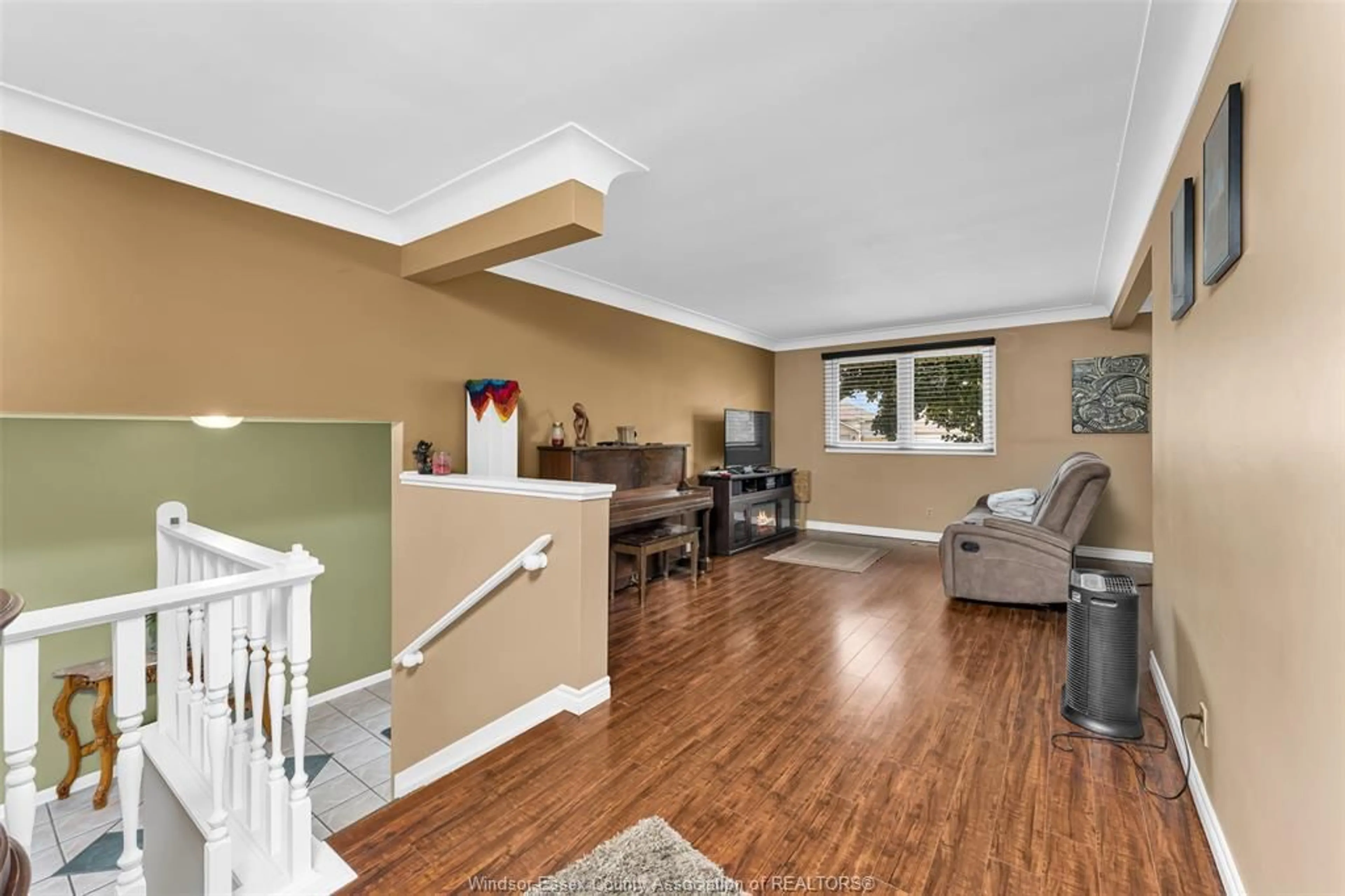 Living room with furniture, wood/laminate floor for 7165 MALDEN Rd, LaSalle Ontario N9J 2T8
