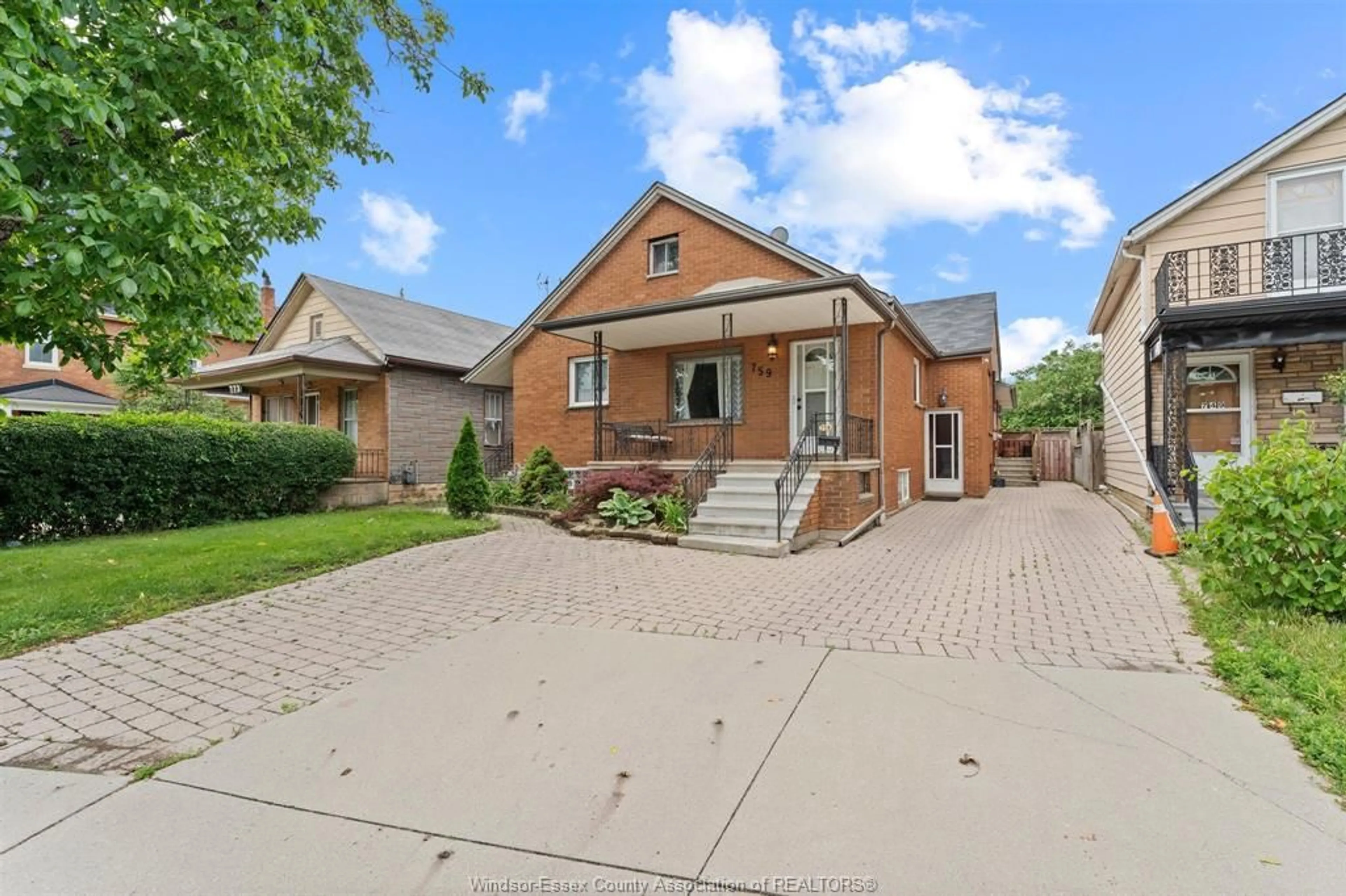 Home with brick exterior material, street for 759 GLENGARRY Ave, Windsor Ontario N9A 1R4