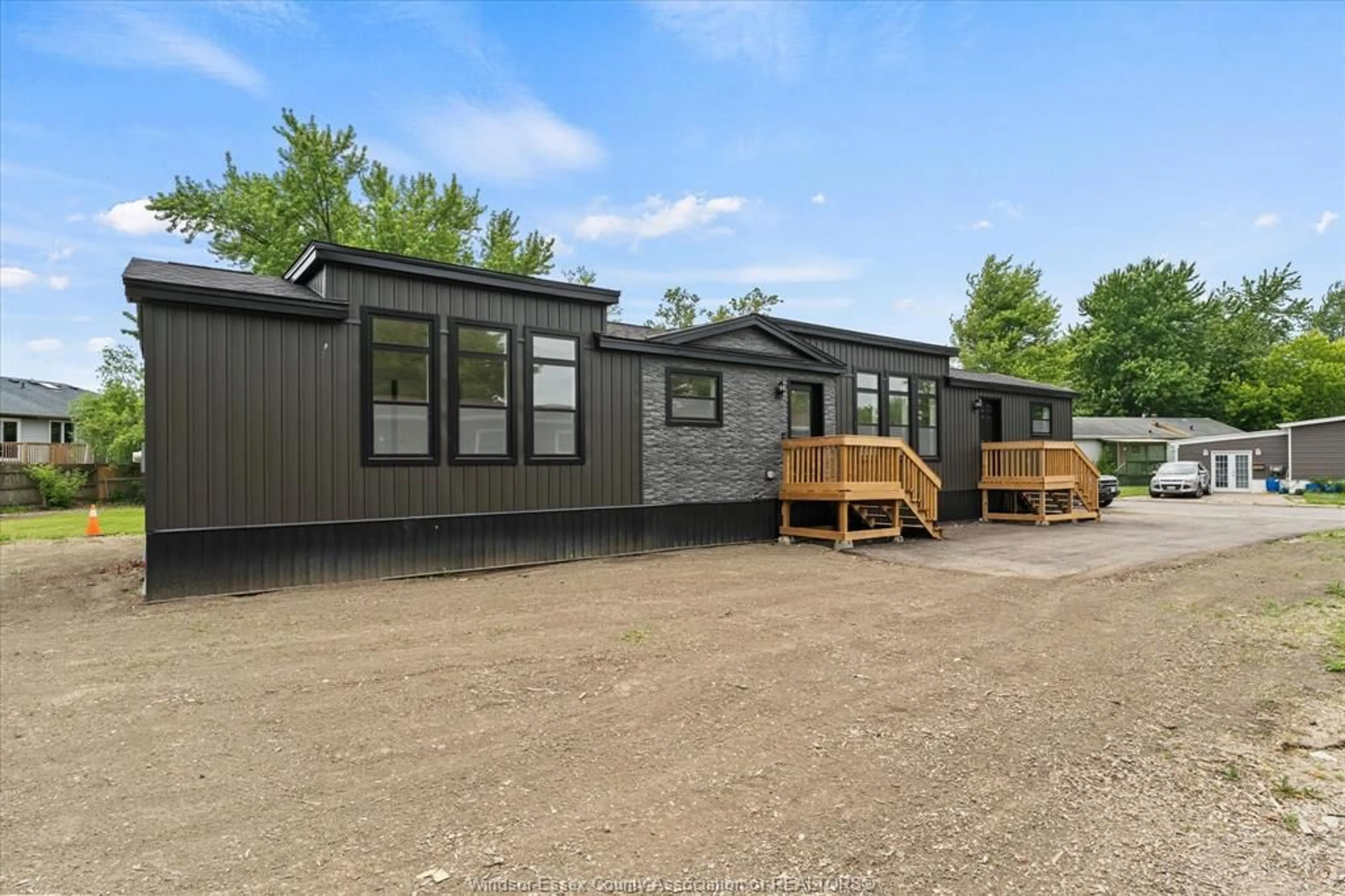 Home with vinyl exterior material, street for 14 DANA, Essex Ontario N8M 1Y9