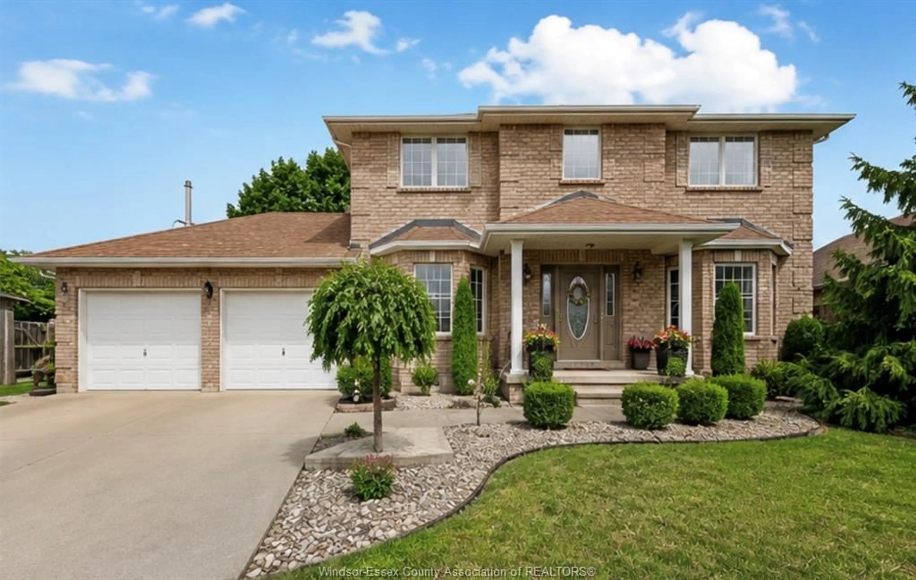 Home with brick exterior material, street for 12314 FUNARO Cres, Tecumseh Ontario N9K 1B2