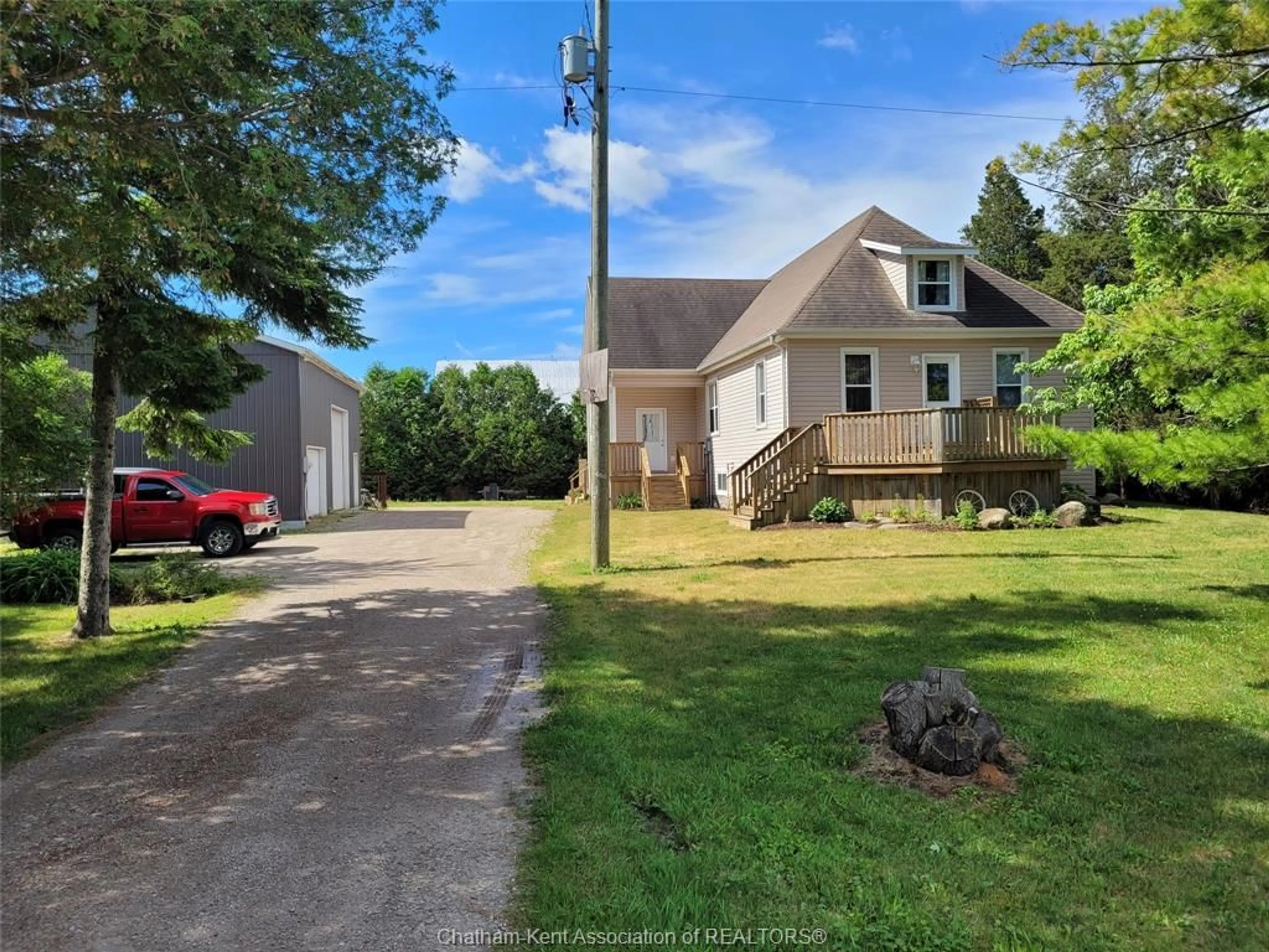 A pic from outside/outdoor area/front of a property/back of a property/a pic from drone, street for 410E CONCESSION Rd. 8 Rd, Kingsville Ontario N0P 2G0