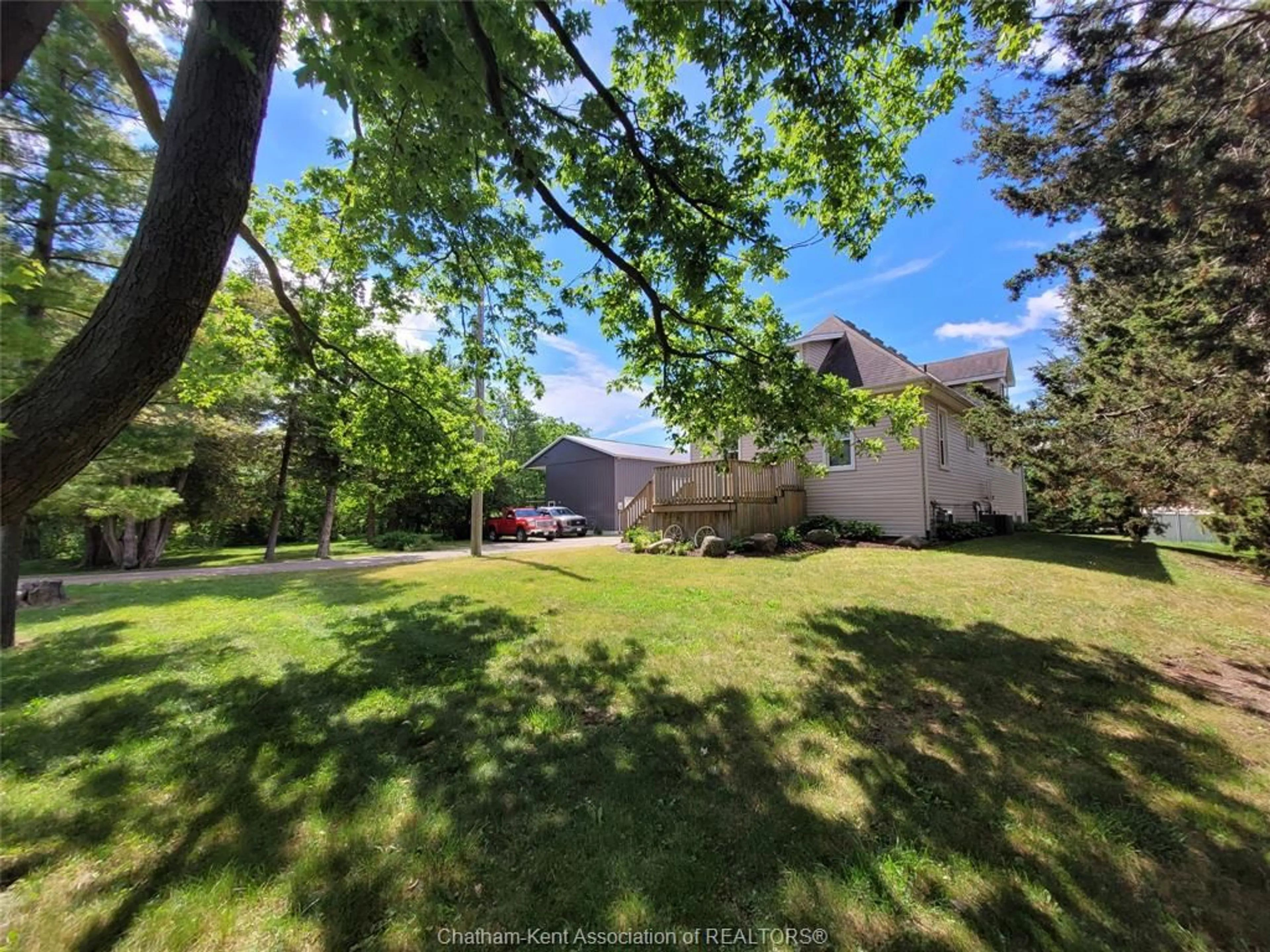 A pic from outside/outdoor area/front of a property/back of a property/a pic from drone, forest/trees view for 410E CONCESSION Rd. 8 Rd, Kingsville Ontario N0P 2G0