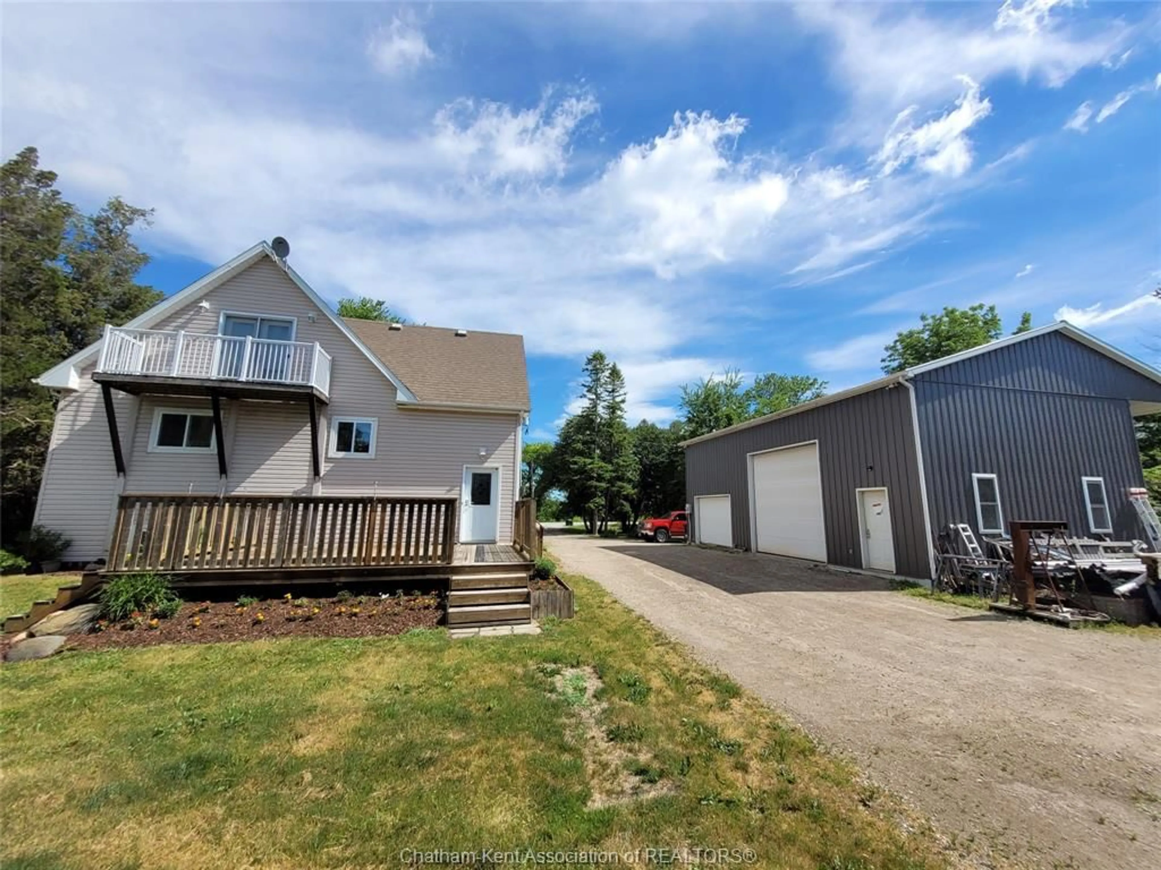 A pic from outside/outdoor area/front of a property/back of a property/a pic from drone, street for 410E CONCESSION Rd. 8 Rd, Kingsville Ontario N0P 2G0