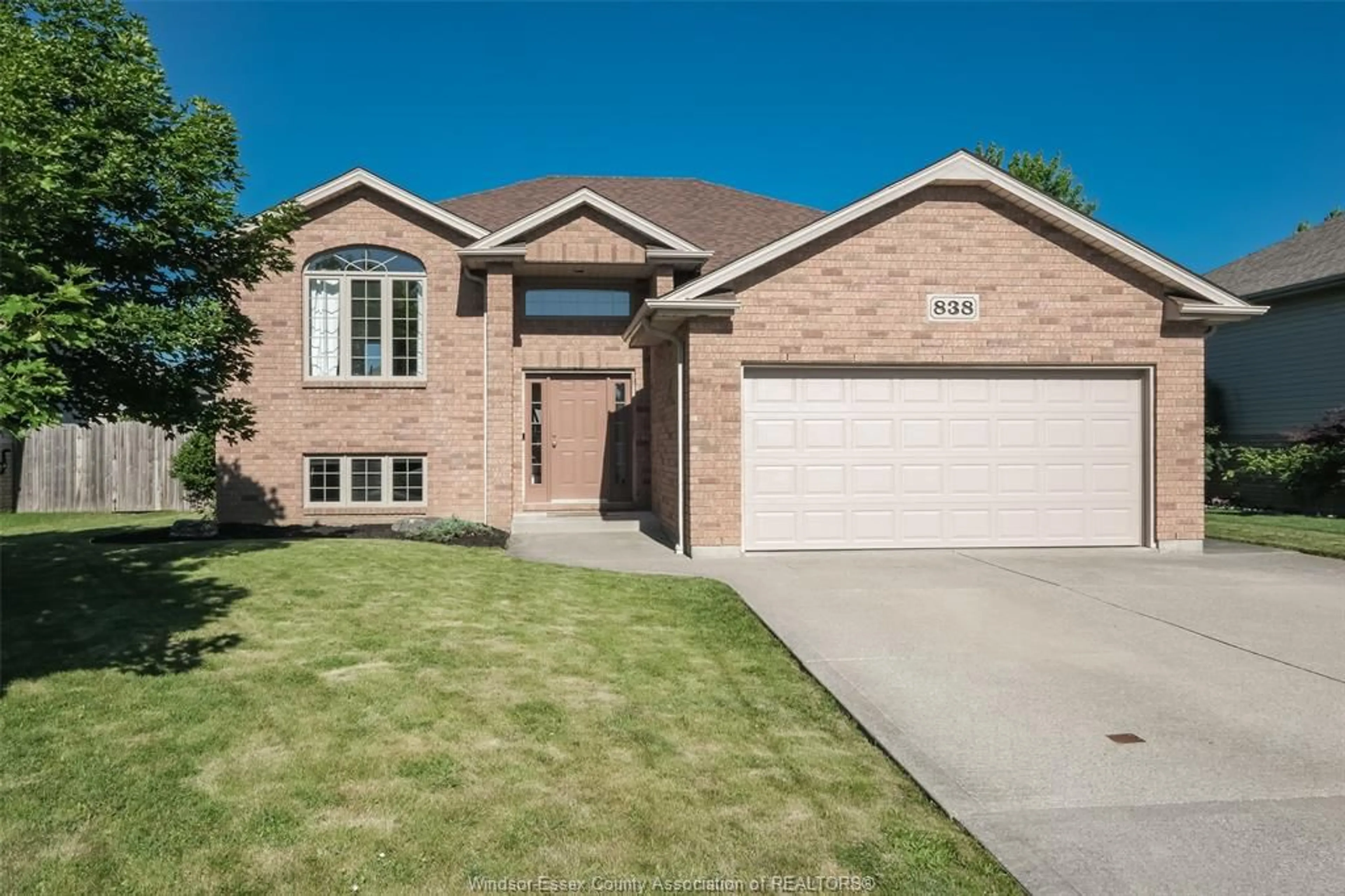 Home with brick exterior material, street for 838 SOUTHWOOD Dr, Lakeshore Ontario N8L 1G1