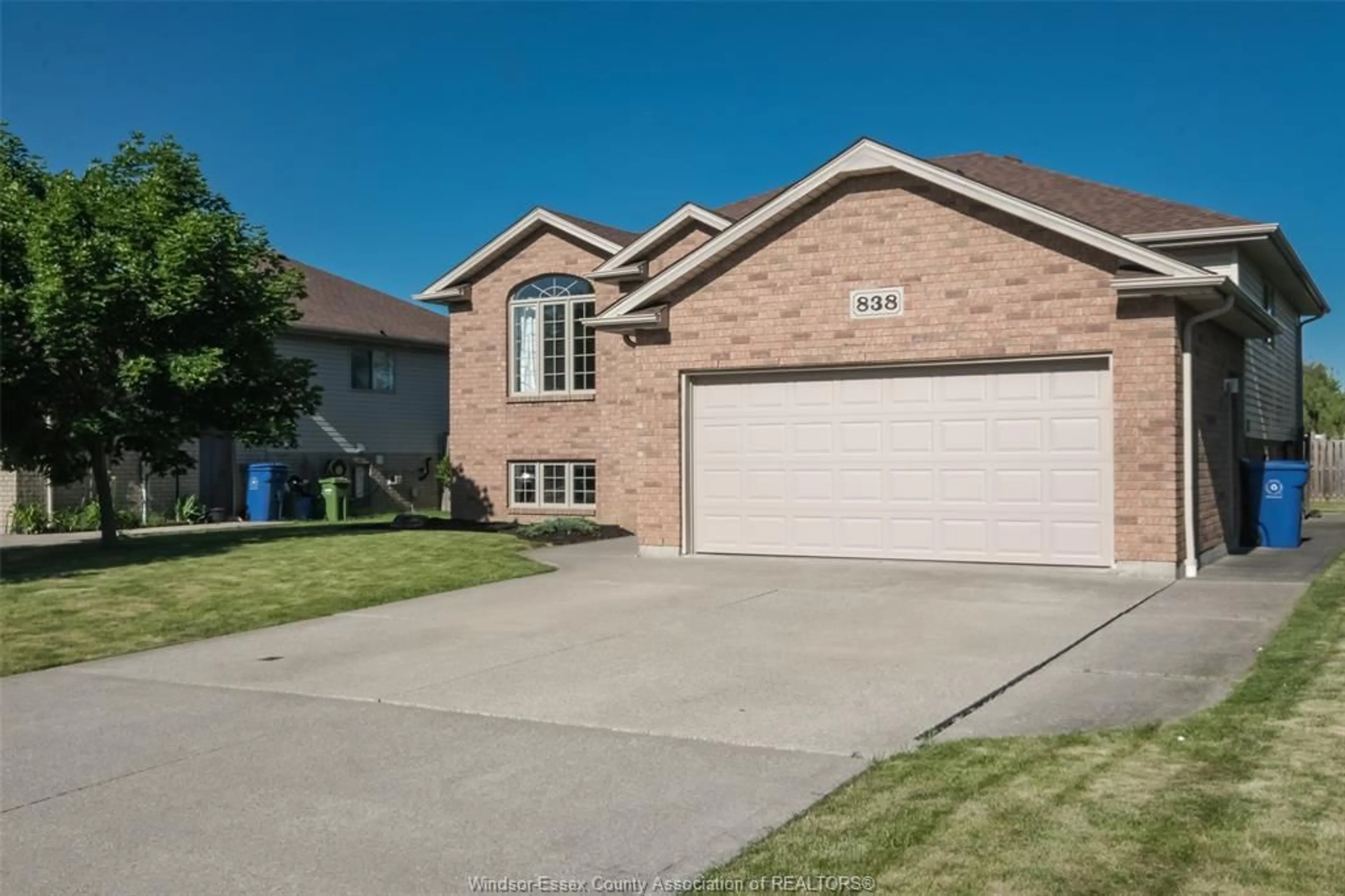 Home with brick exterior material, street for 838 SOUTHWOOD Dr, Lakeshore Ontario N8L 1G1