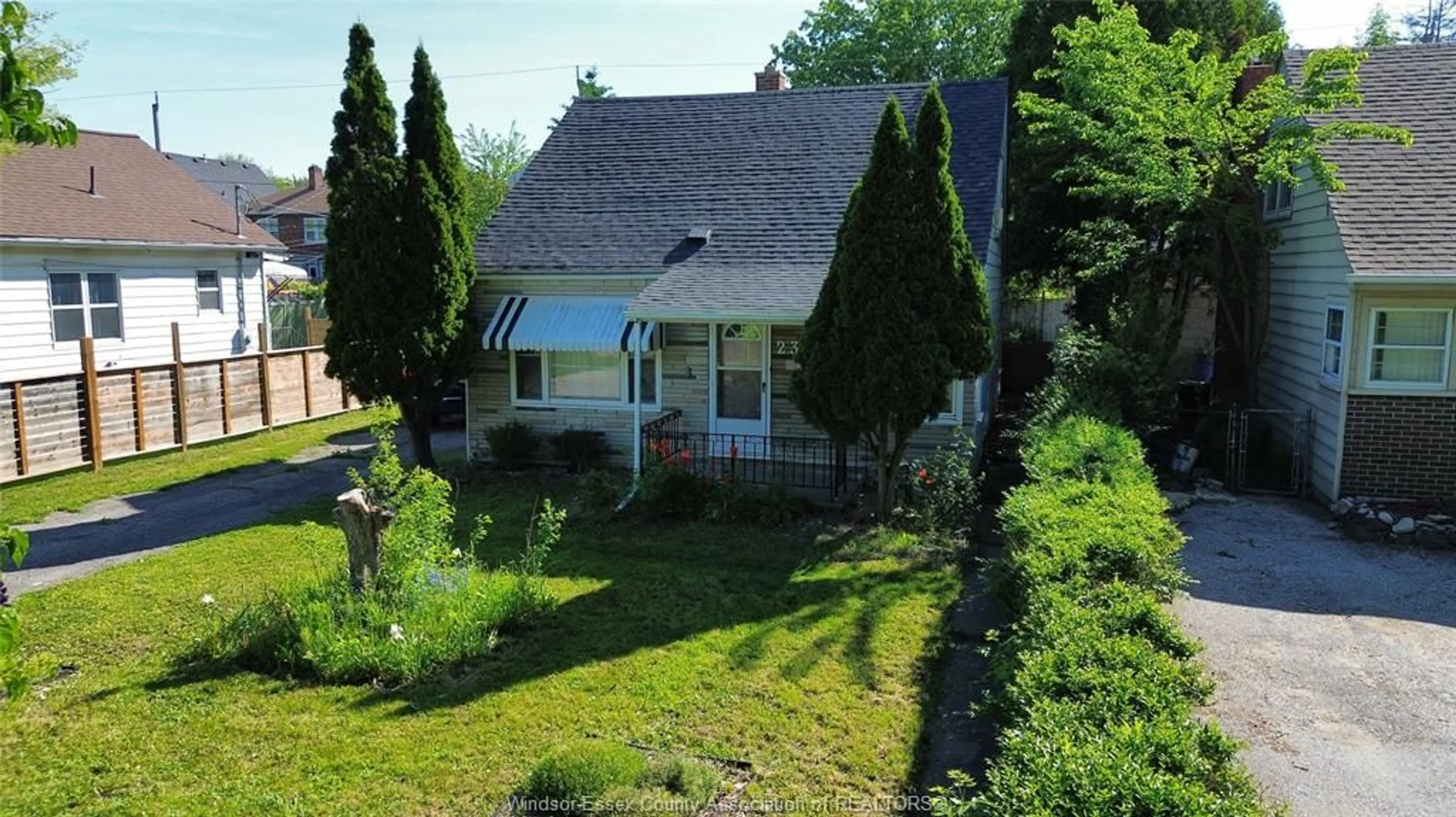 A pic from outside/outdoor area/front of a property/back of a property/a pic from drone, street for 2354 Highland Ave, Windsor Ontario N8X 3S5