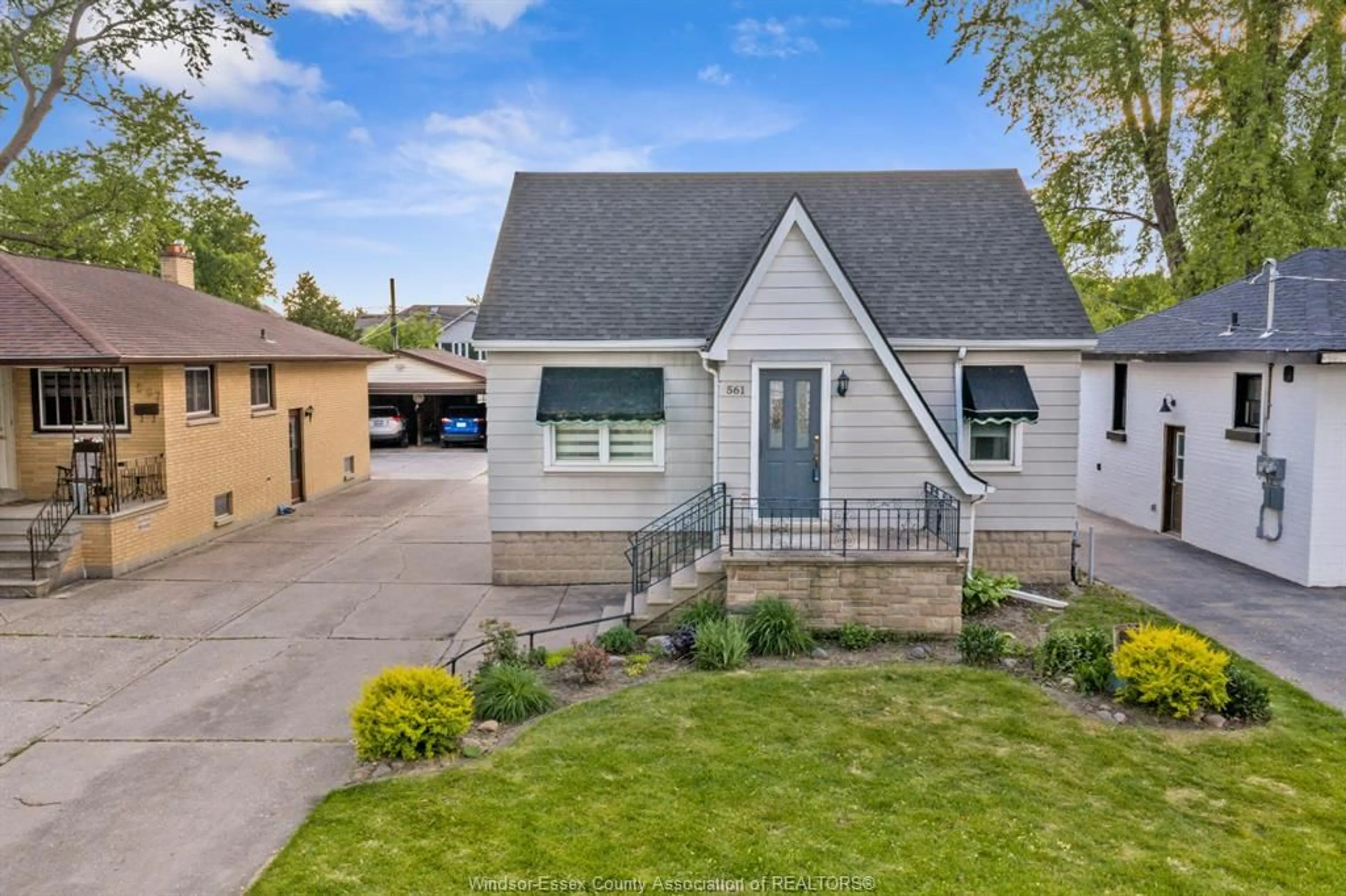 Home with vinyl exterior material, street for 561 ELINOR St, Windsor Ontario N8P 1E3