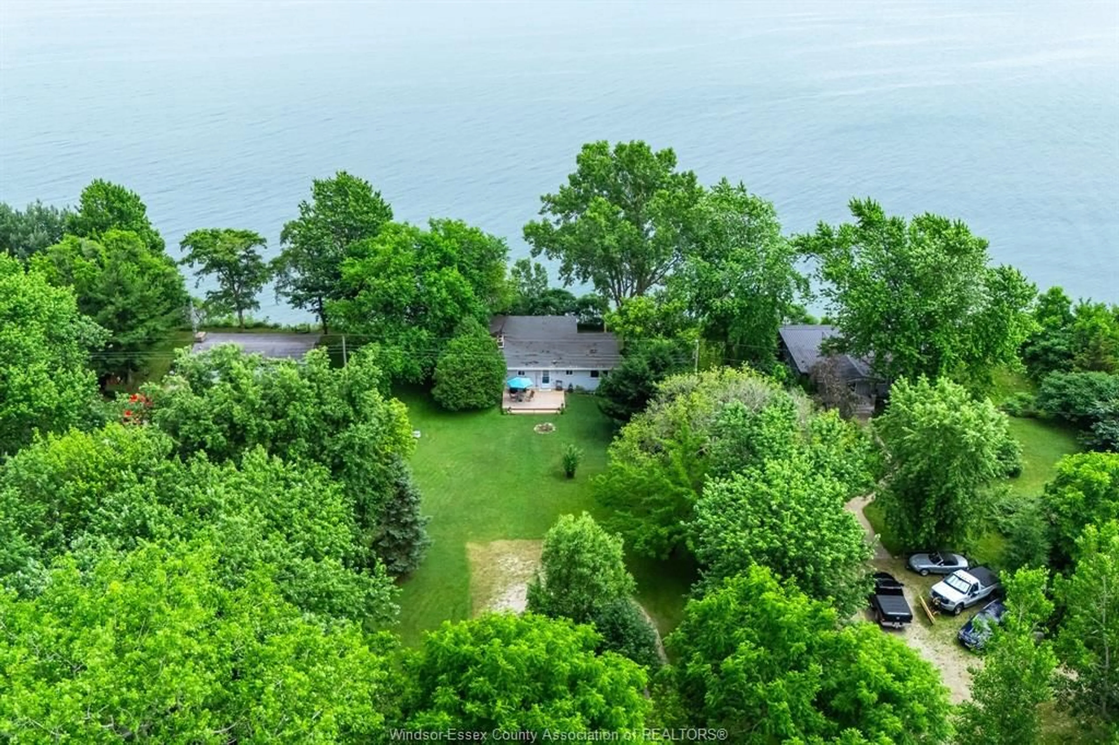 A pic from outside/outdoor area/front of a property/back of a property/a pic from drone, water/lake/river/ocean view for 1608 Tilton Line, Wheatley Ontario N0P 2P0