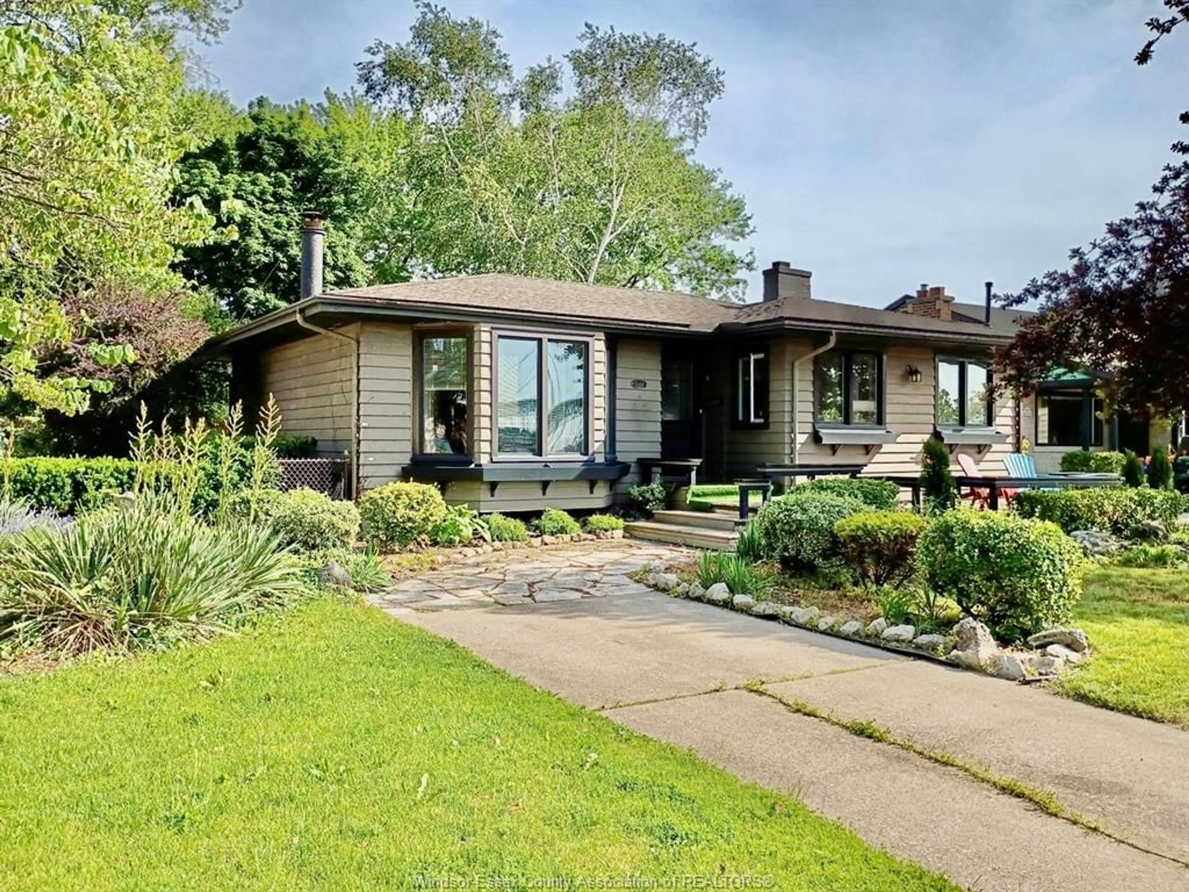 Home with brick exterior material, street for 2437 RIVERSIDE Dr, Windsor Ontario N9B 1B2