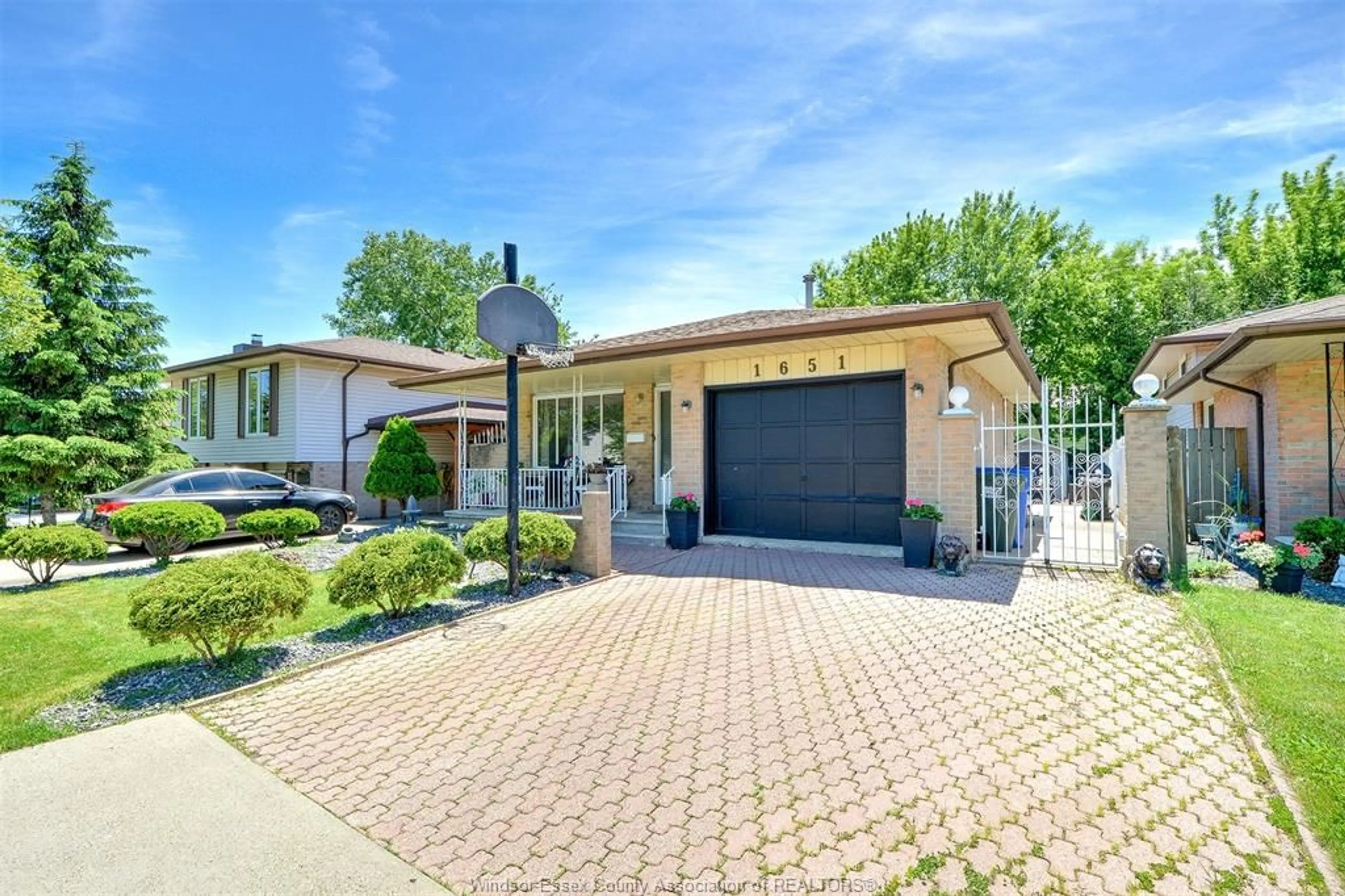 Home with brick exterior material, street for 1651 COURTLAND, Windsor Ontario N8T 3K5