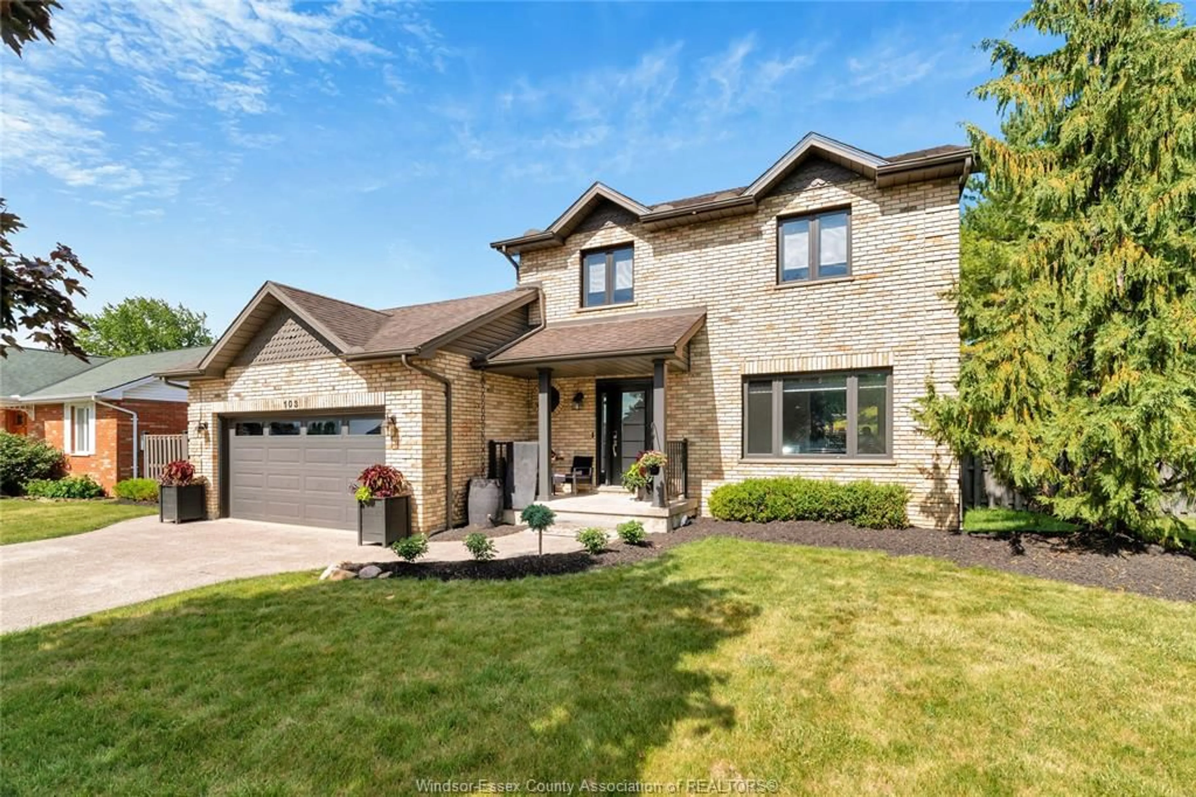 Home with brick exterior material, street for 103 PIERELLA Dr, Lakeshore Ontario N0R 1A0