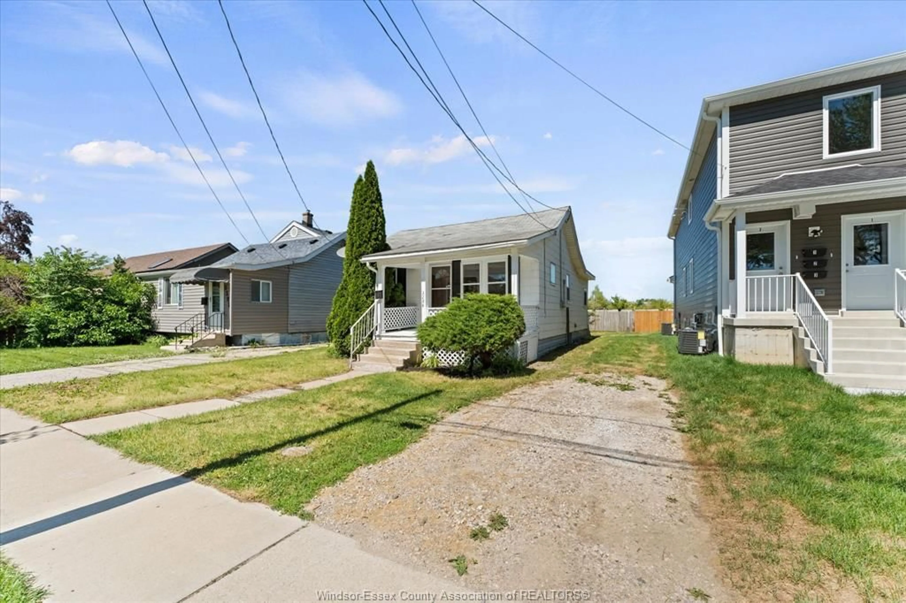 A pic from outside/outdoor area/front of a property/back of a property/a pic from drone, street for 3286 RIBERDY Rd, Windsor Ontario N8W 3T9