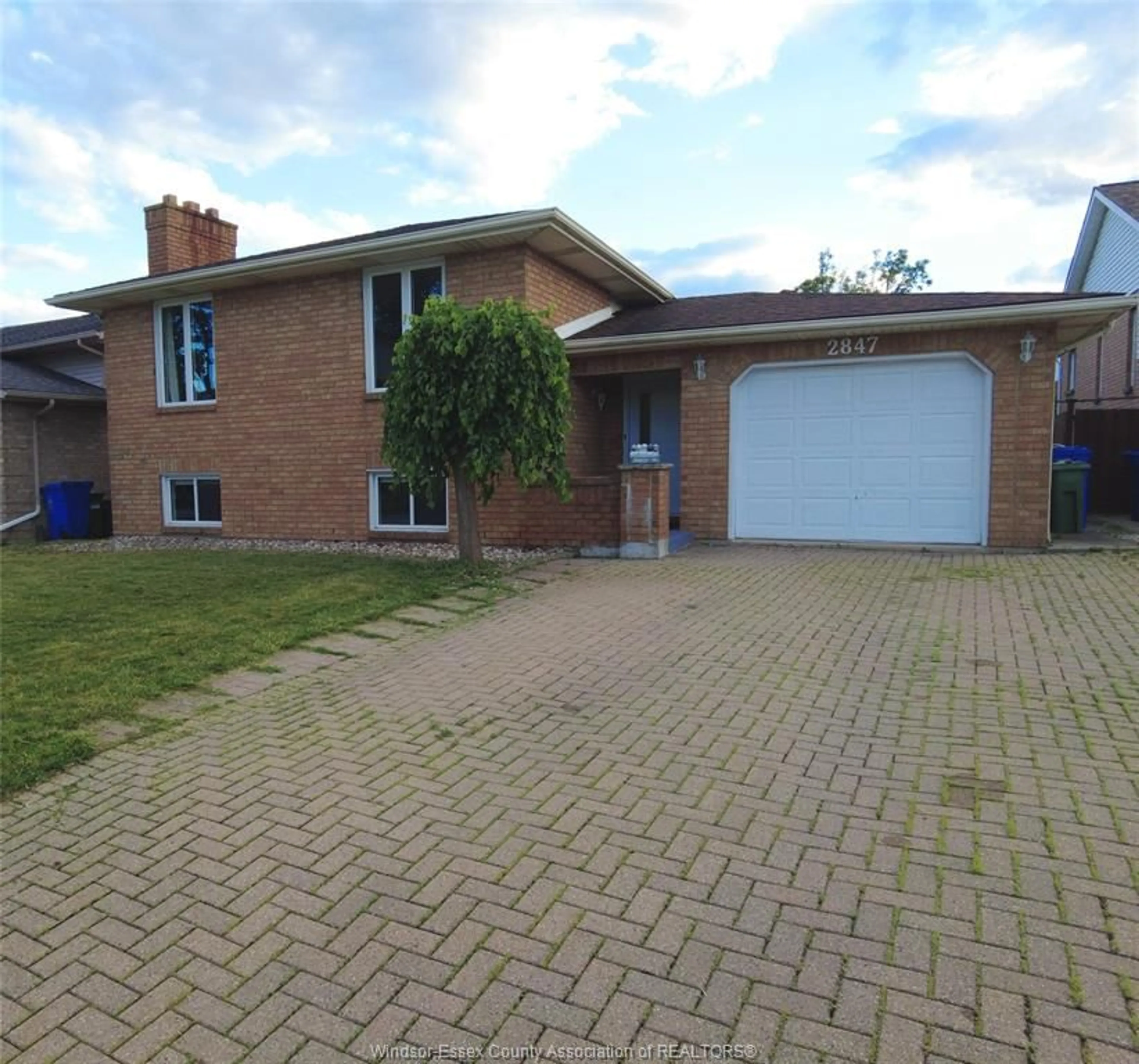 Home with brick exterior material, street for 2847 MANGIN Cres, Windsor Ontario N9E 4K7