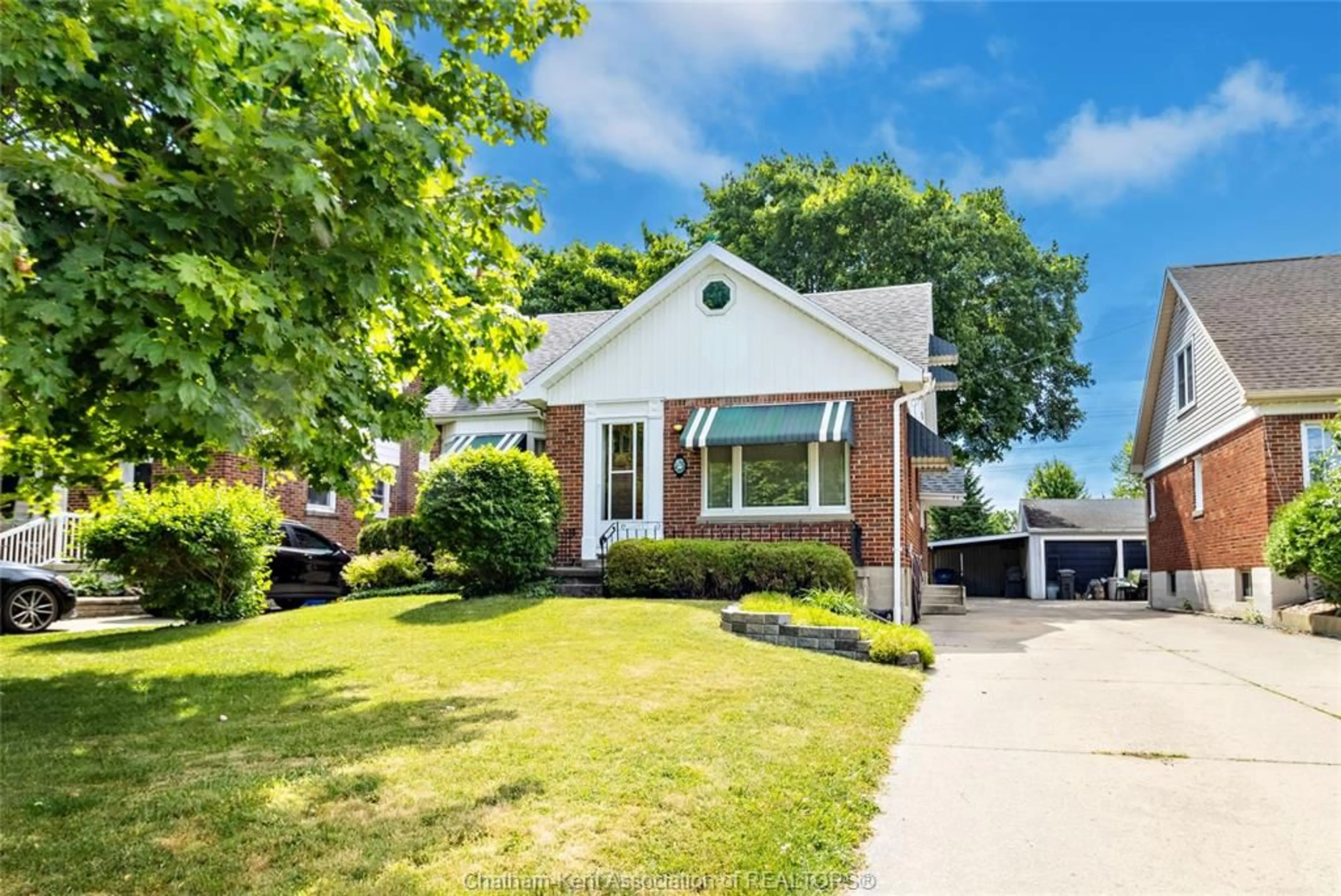 Home with brick exterior material, street for 82 McFadden Ave, Chatham Ontario N7M 1Y6