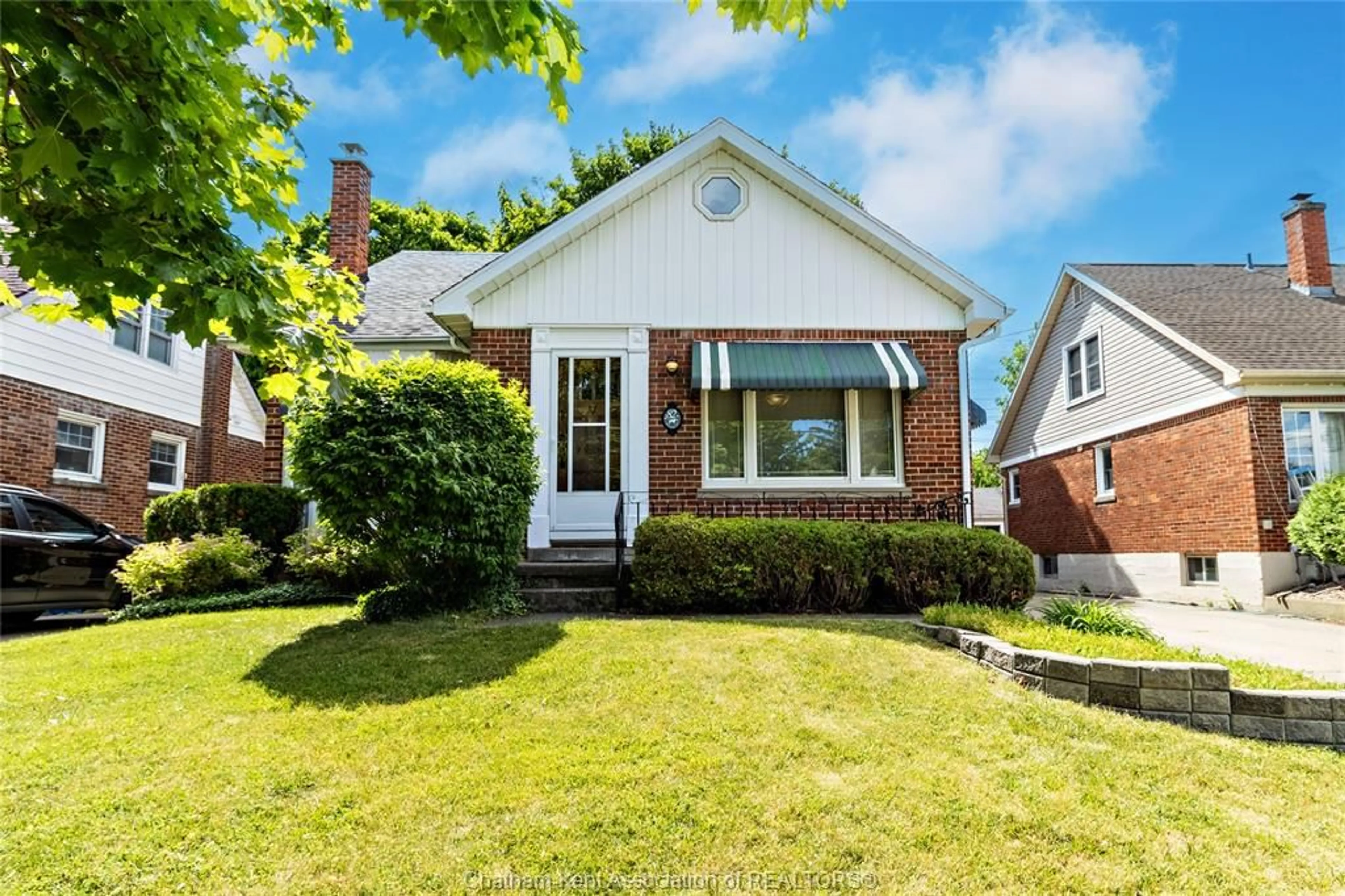 Home with brick exterior material, street for 82 McFadden Ave, Chatham Ontario N7M 1Y6