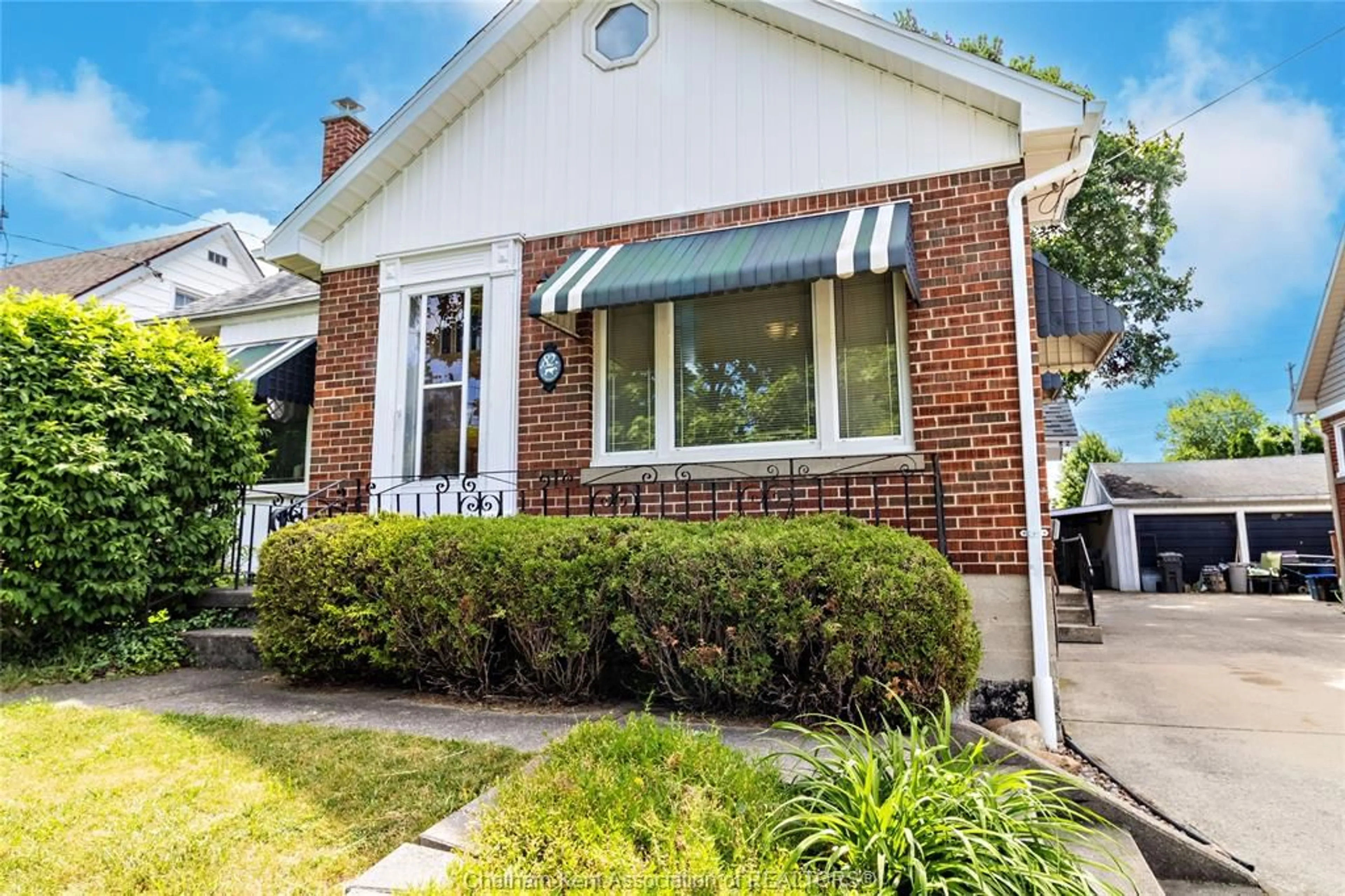 Home with brick exterior material, street for 82 McFadden Ave, Chatham Ontario N7M 1Y6