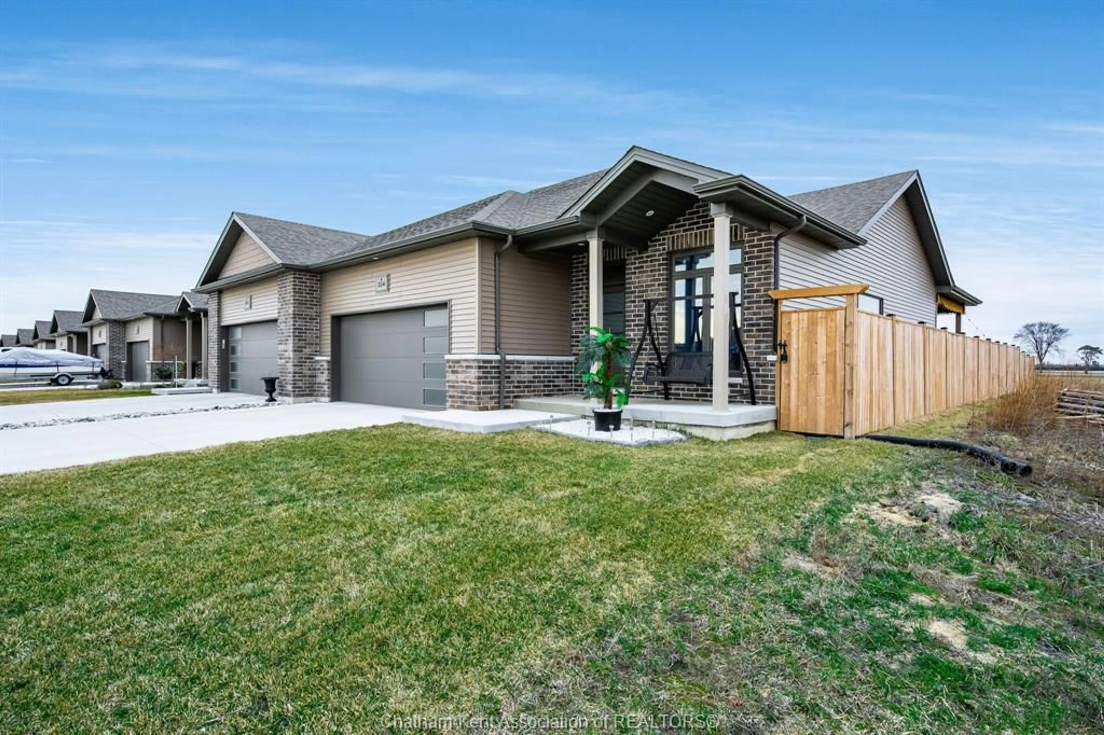 Home with brick exterior material, street for 304 Horizon Lane, Chatham Ontario N7L 0G6