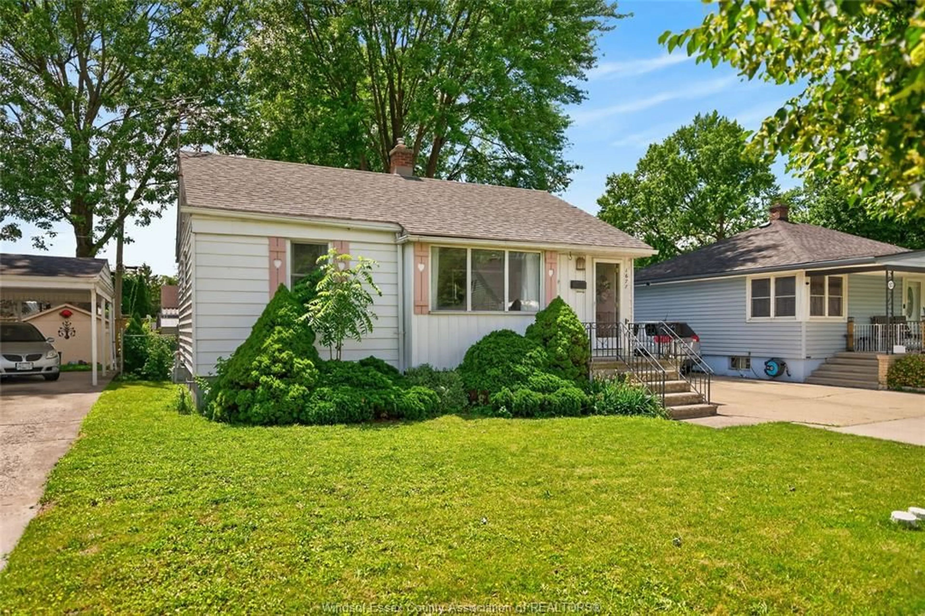 Home with vinyl exterior material, street for 1677 Norman Rd, Windsor Ontario N8Y 4N6