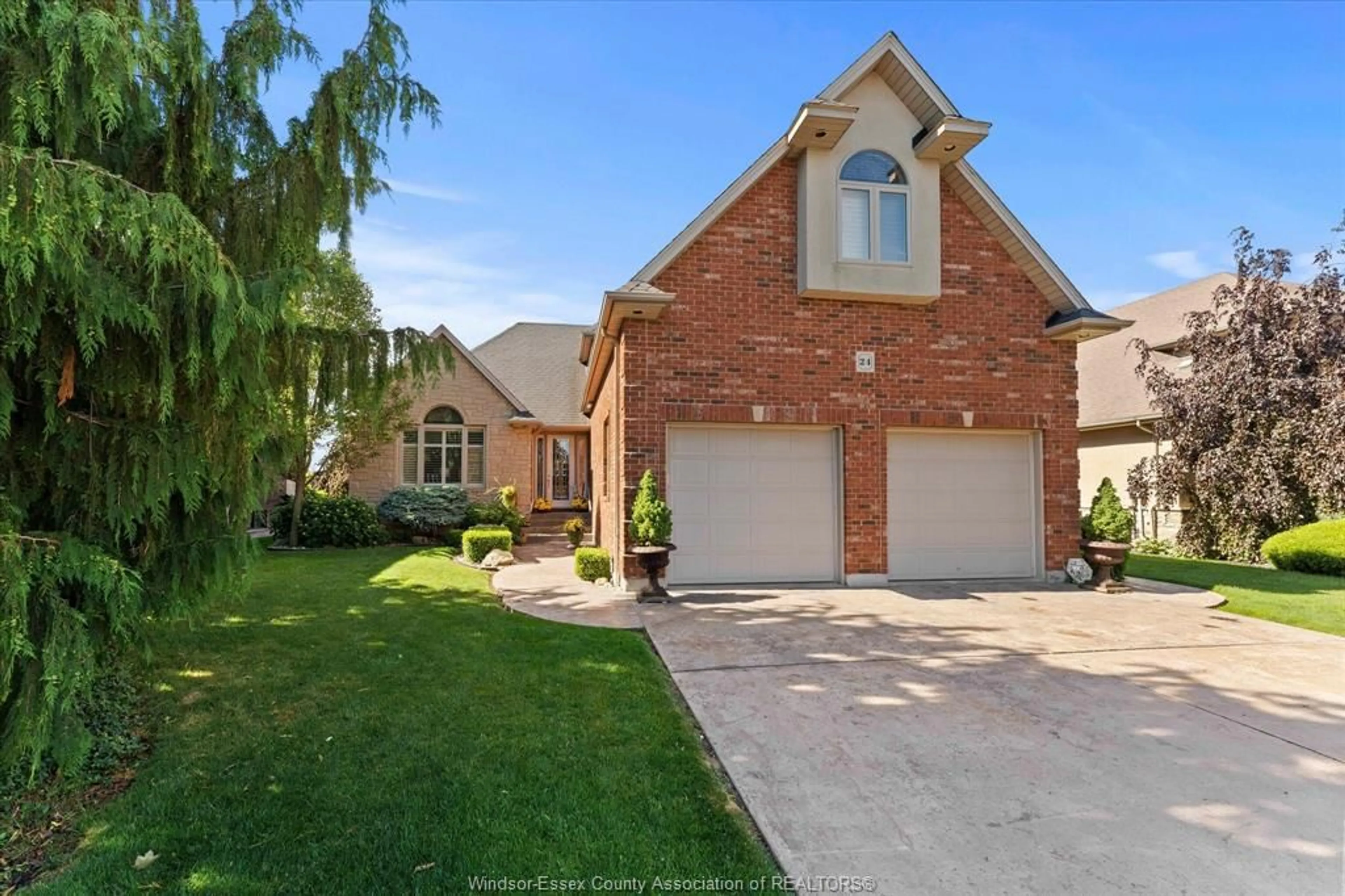 Home with brick exterior material, street for 24 SANDY LAKE, Leamington Ontario N8H 5J3