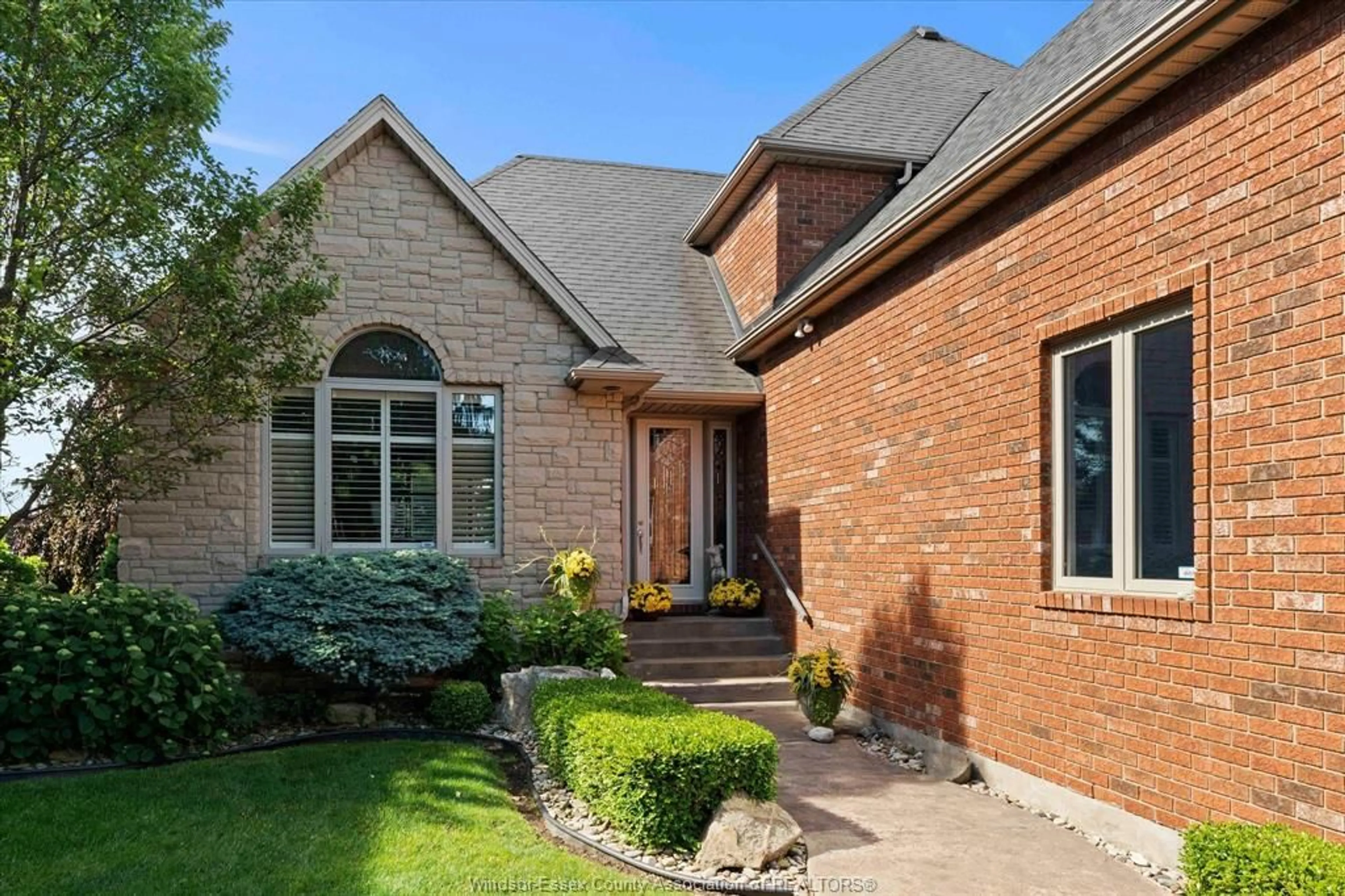 Home with brick exterior material, street for 24 SANDY LAKE, Leamington Ontario N8H 5J3