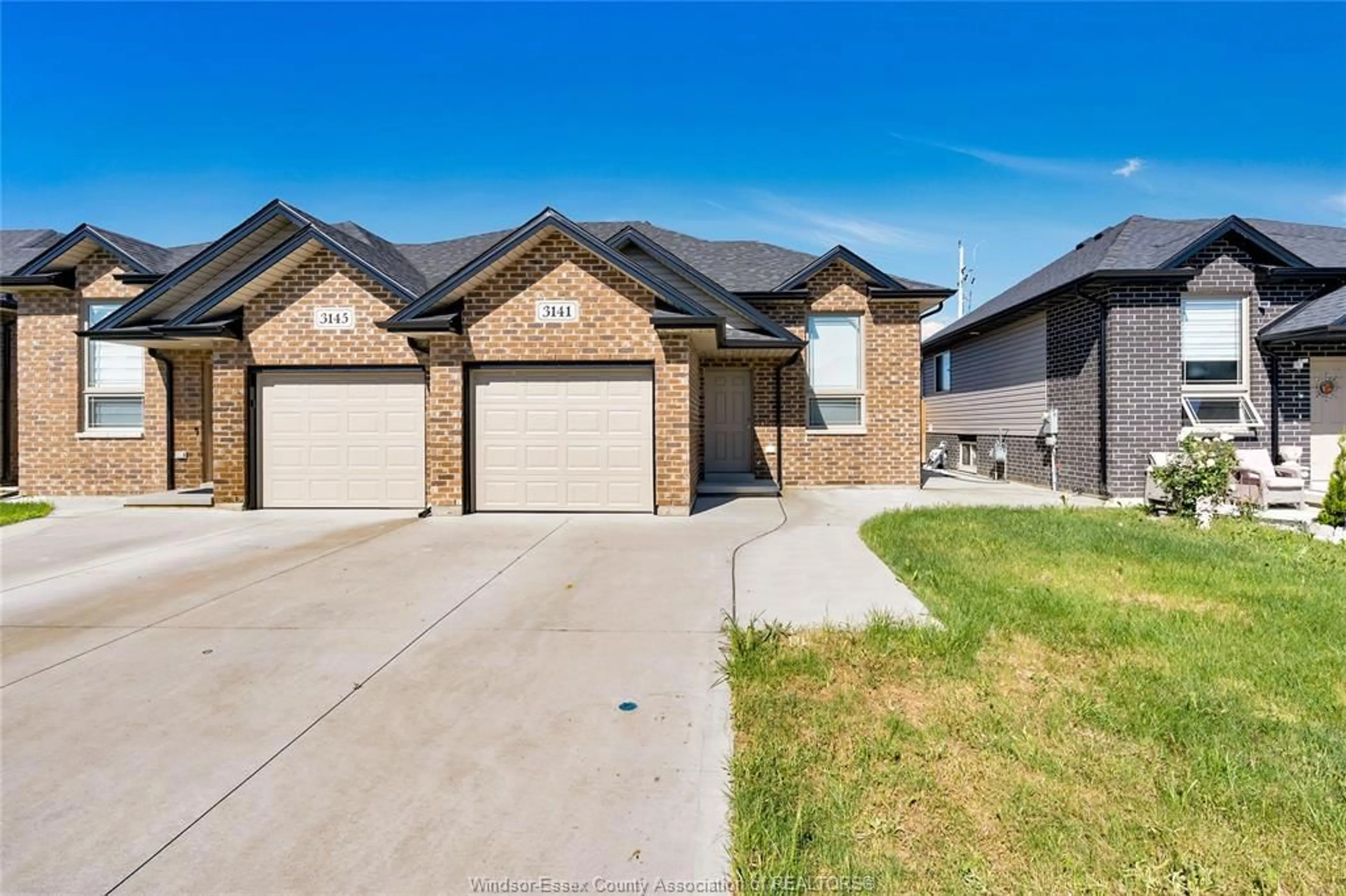Home with brick exterior material, street for 3141 VIOLA Cres, Windsor Ontario N8N 0A2
