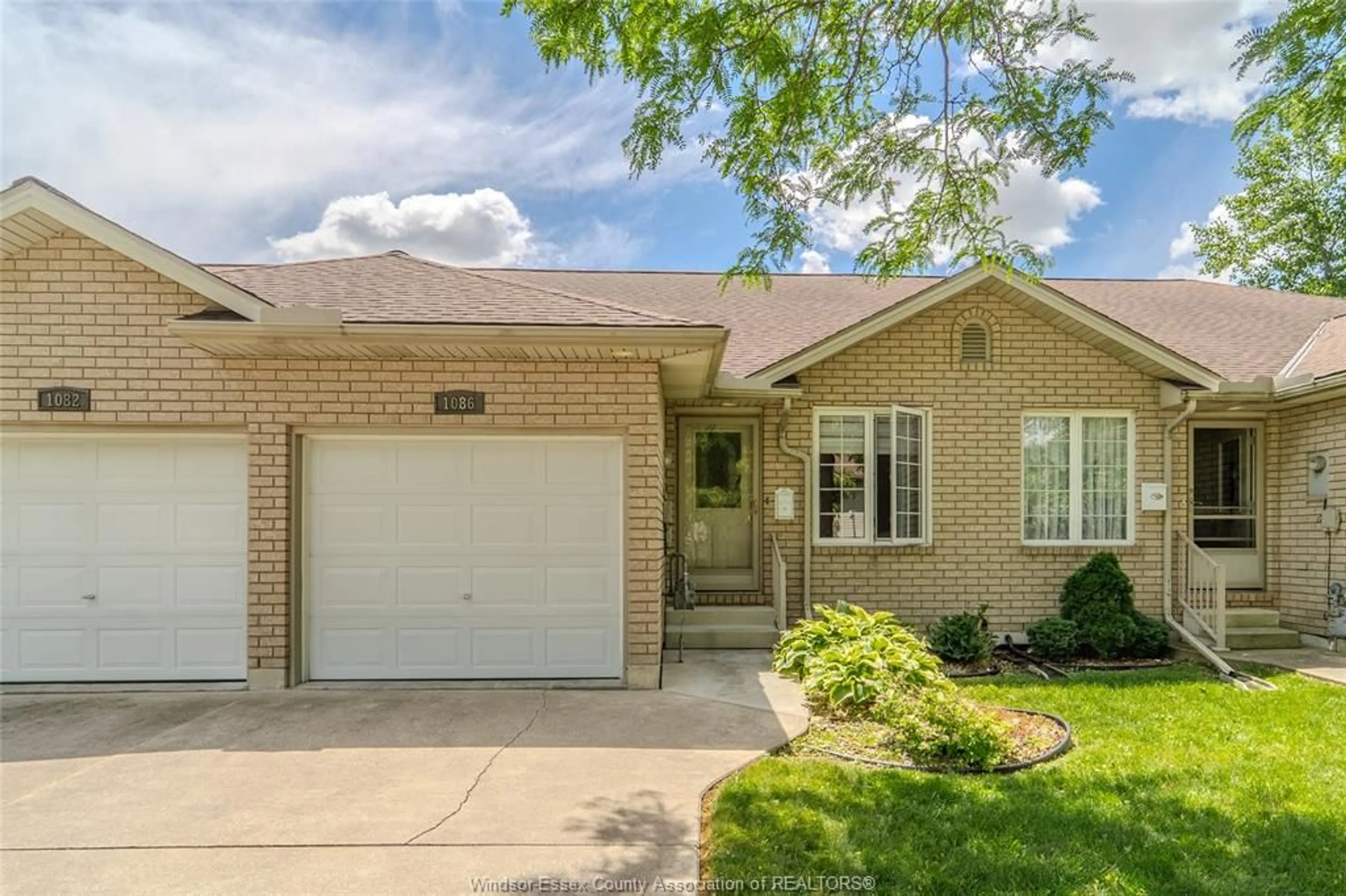 Home with brick exterior material, street for 1086 Lexington Cir, Windsor Ontario N8S 4T3