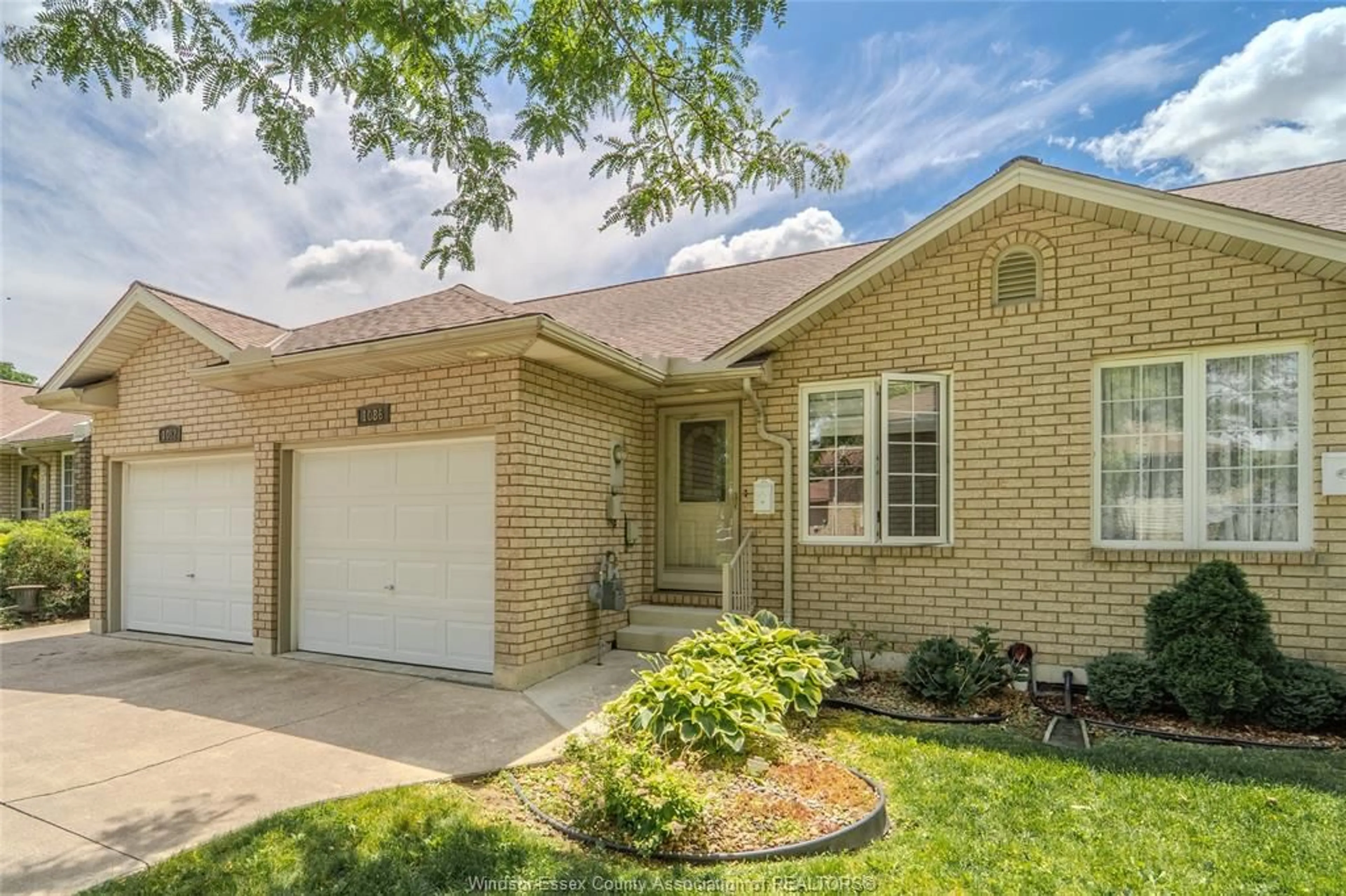 Home with brick exterior material, street for 1086 Lexington Cir, Windsor Ontario N8S 4T3