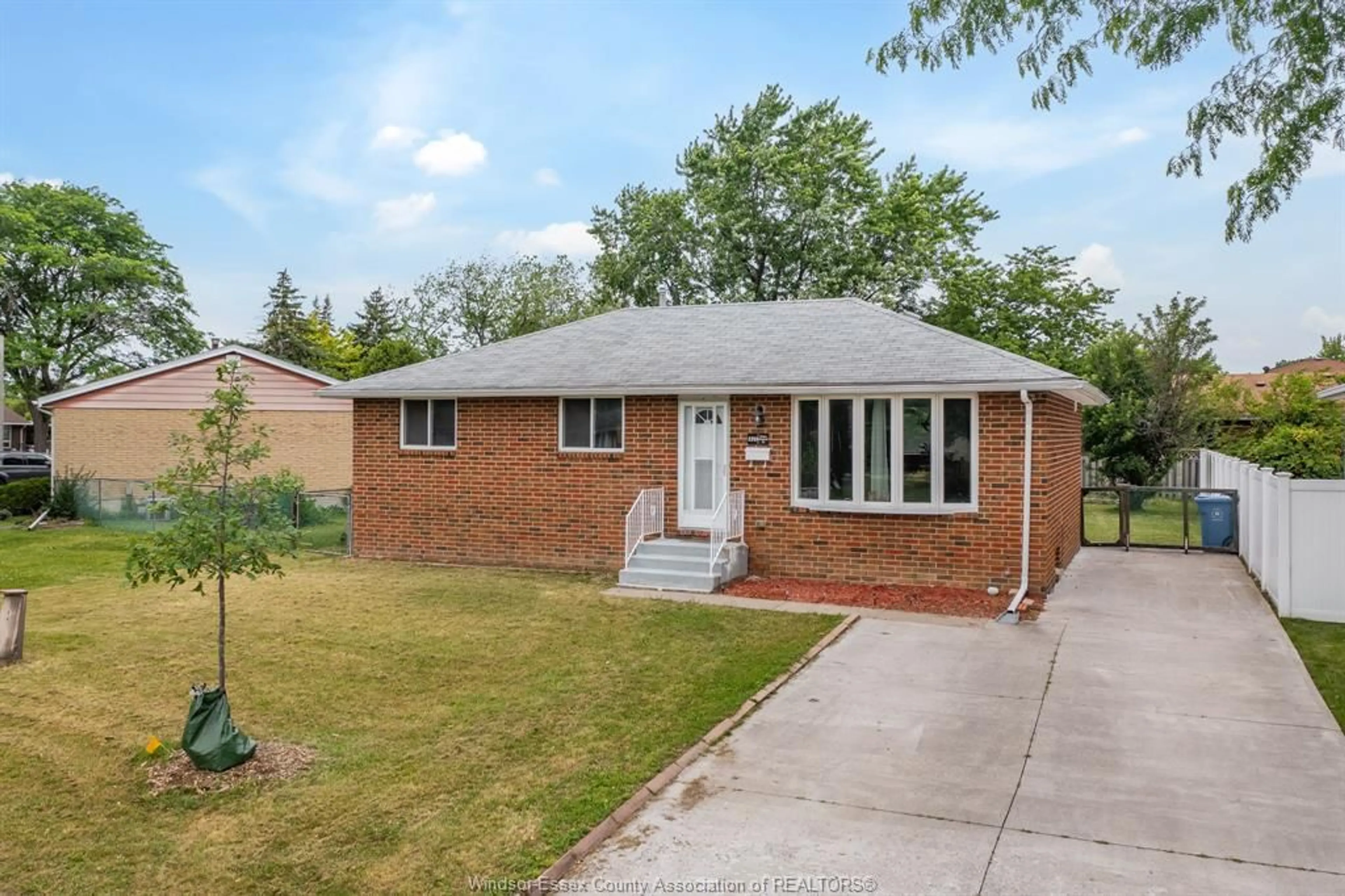 Home with brick exterior material, street for 5210 QUEEN ELIZABETH Dr, Windsor Ontario N8T 1N3