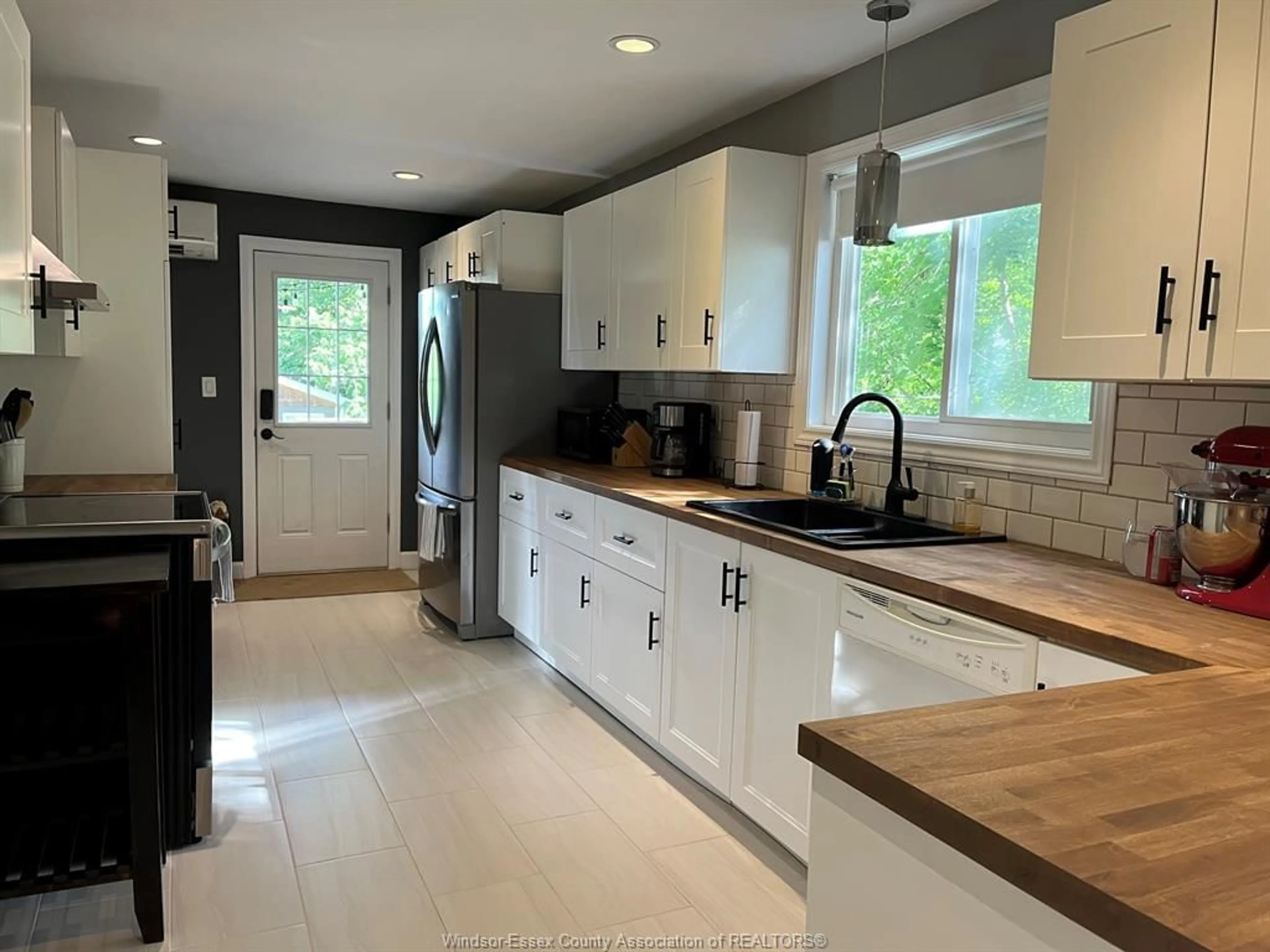 Open concept kitchen, ceramic/tile floor for 769 Assumption, Windsor Ontario N9A 3B7