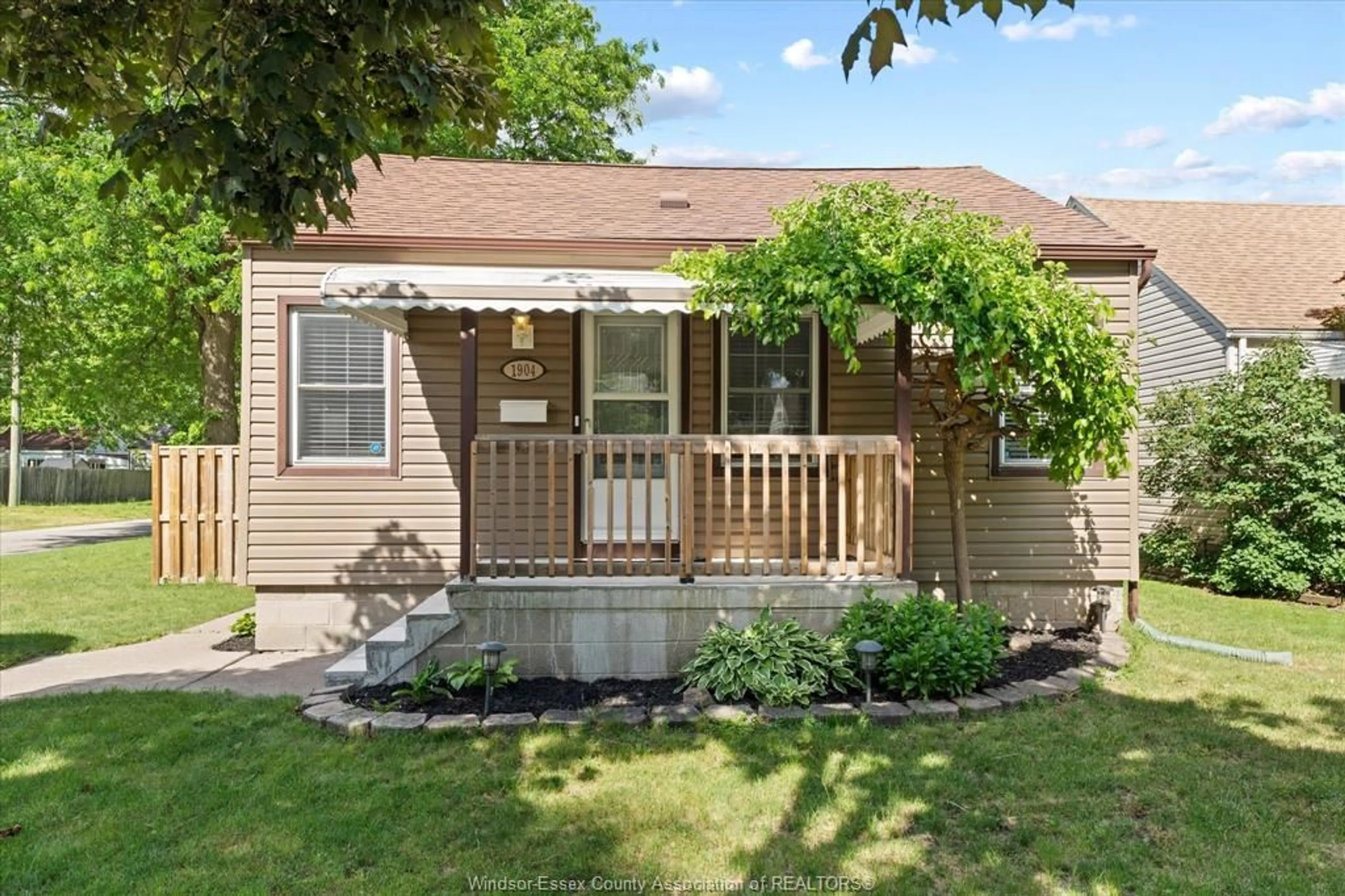 Home with vinyl exterior material, street for 1904 WESTCOTT, Windsor Ontario N8W 4K4