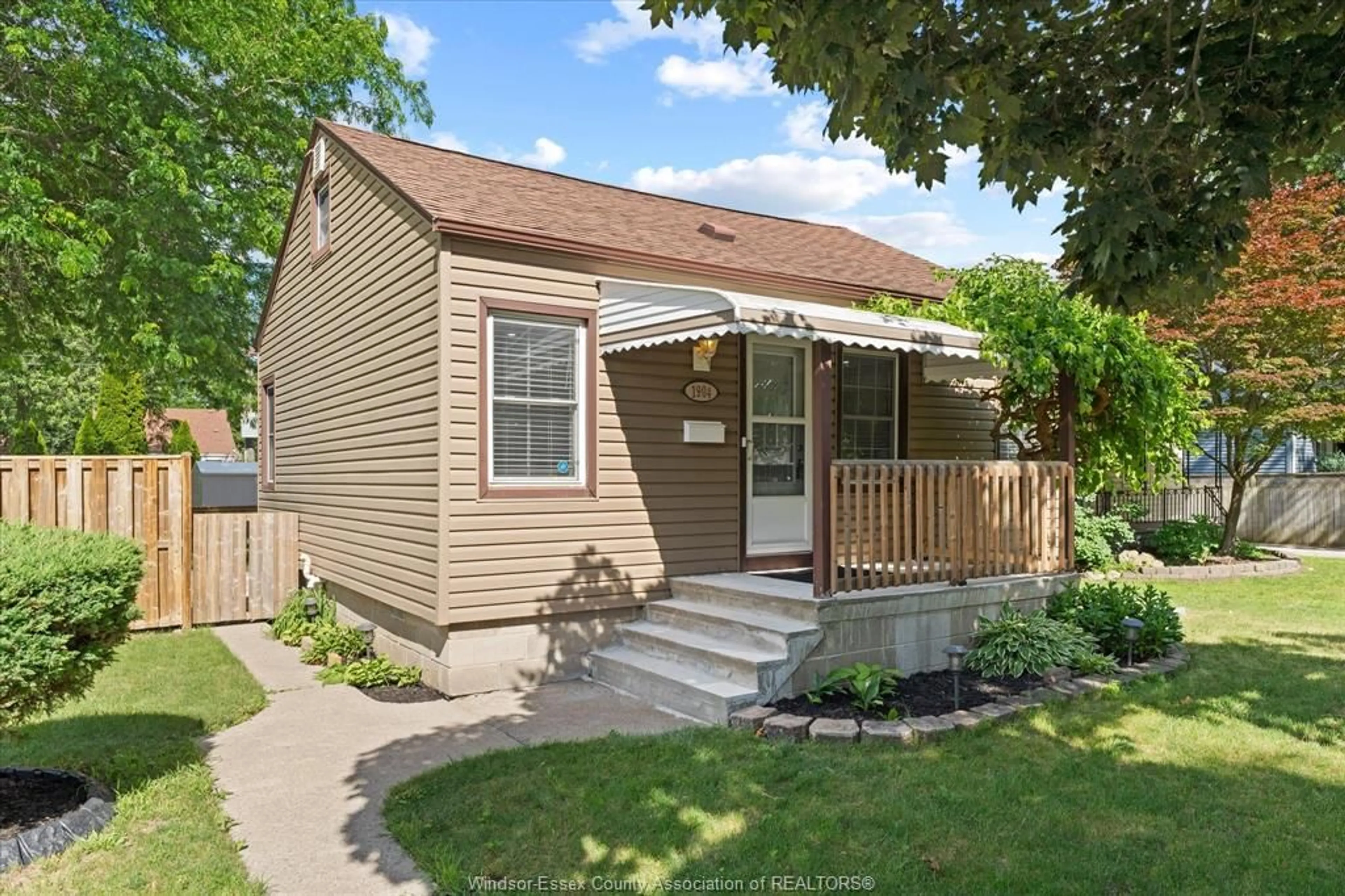 Home with vinyl exterior material, street for 1904 WESTCOTT, Windsor Ontario N8W 4K4