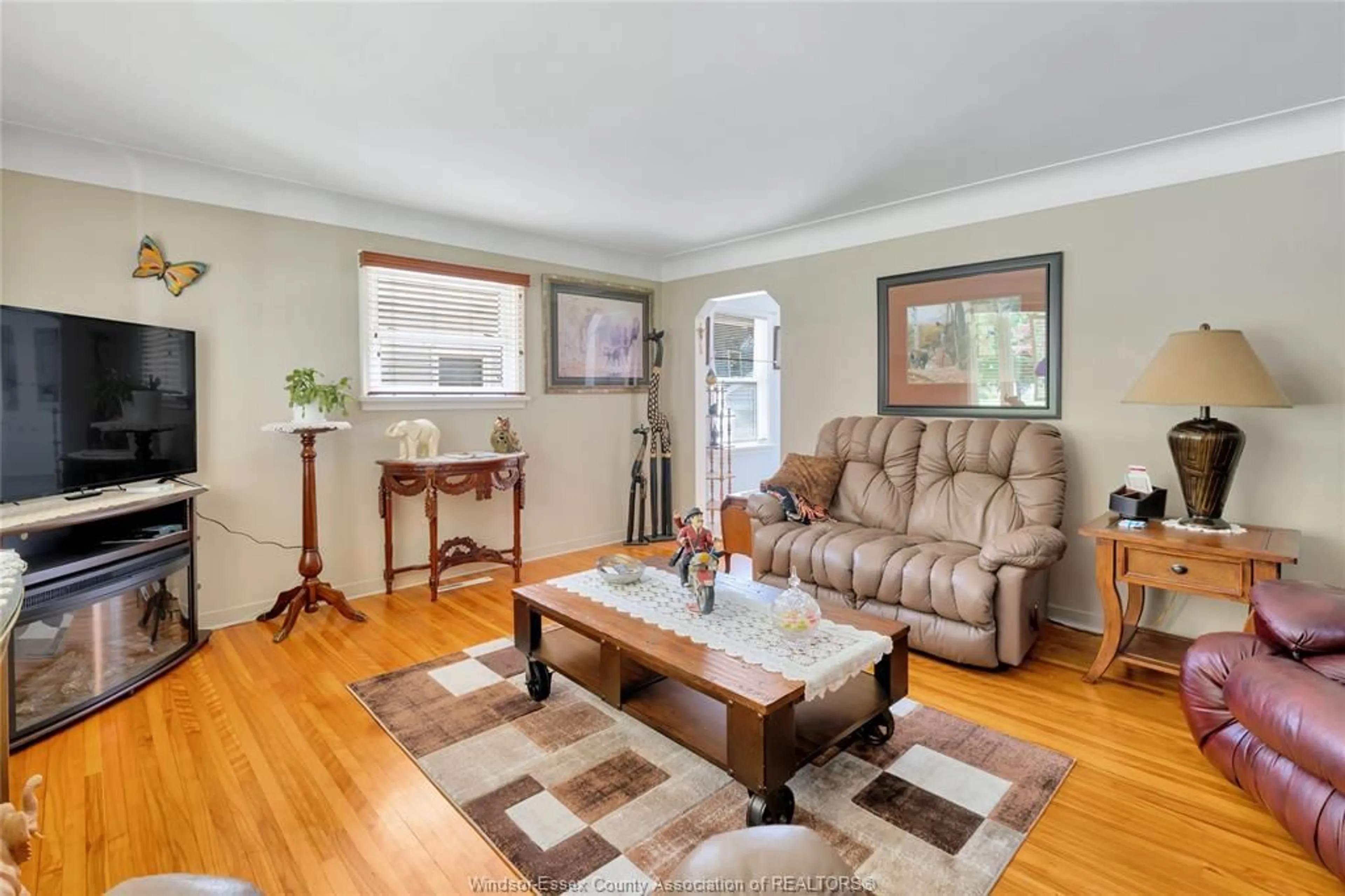Living room with furniture, wood/laminate floor for 46 GRACE Ave, Leamington Ontario N8H 1K9