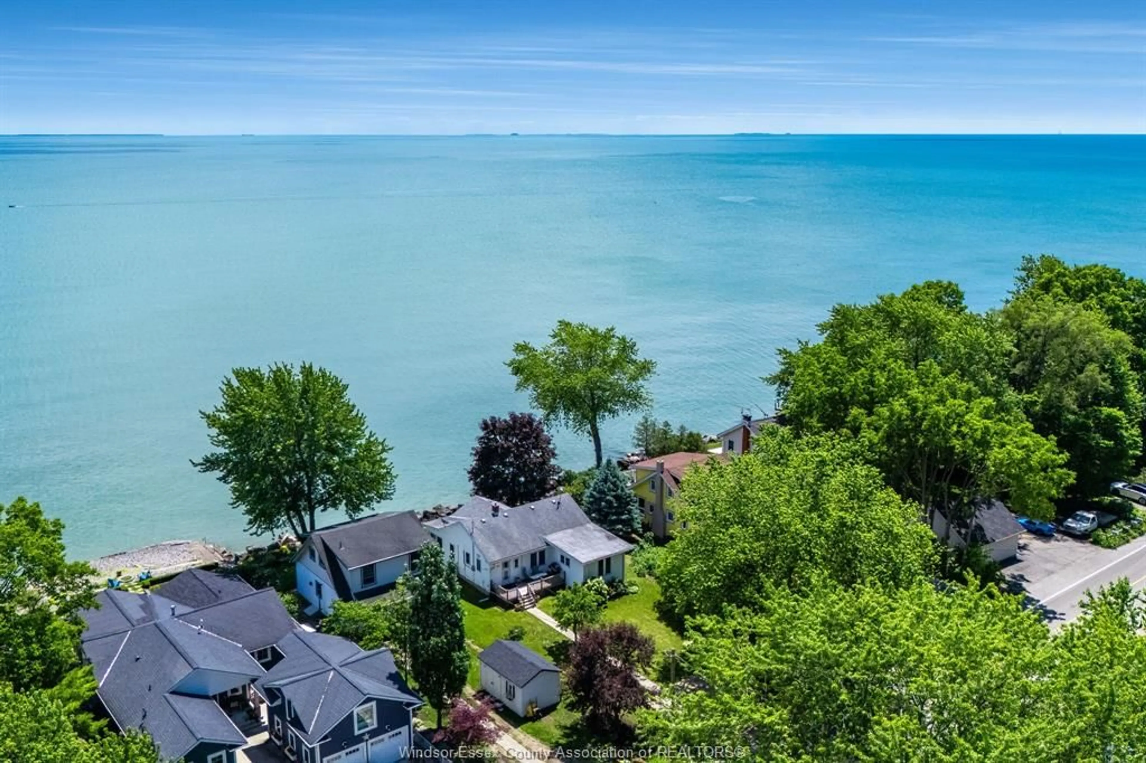 A pic from outside/outdoor area/front of a property/back of a property/a pic from drone, water/lake/river/ocean view for 1263 Heritage Rd, Kingsville Ontario N9Y 2E6