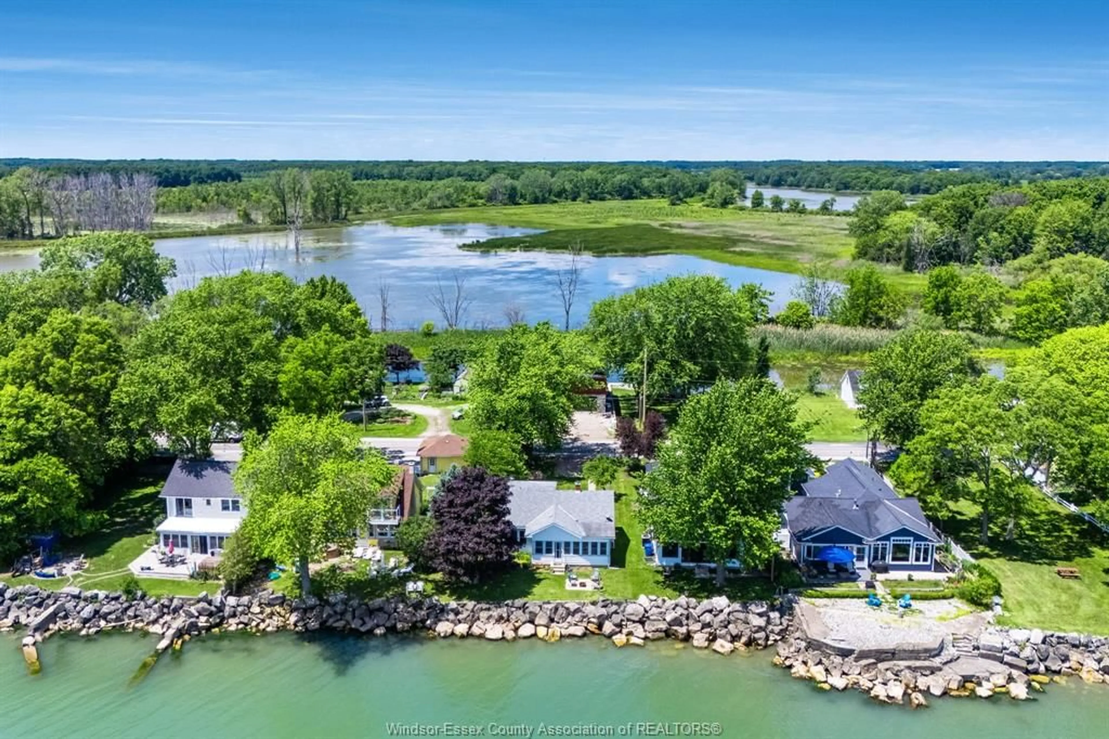 A pic from outside/outdoor area/front of a property/back of a property/a pic from drone, water/lake/river/ocean view for 1263 Heritage Rd, Kingsville Ontario N9Y 2E6