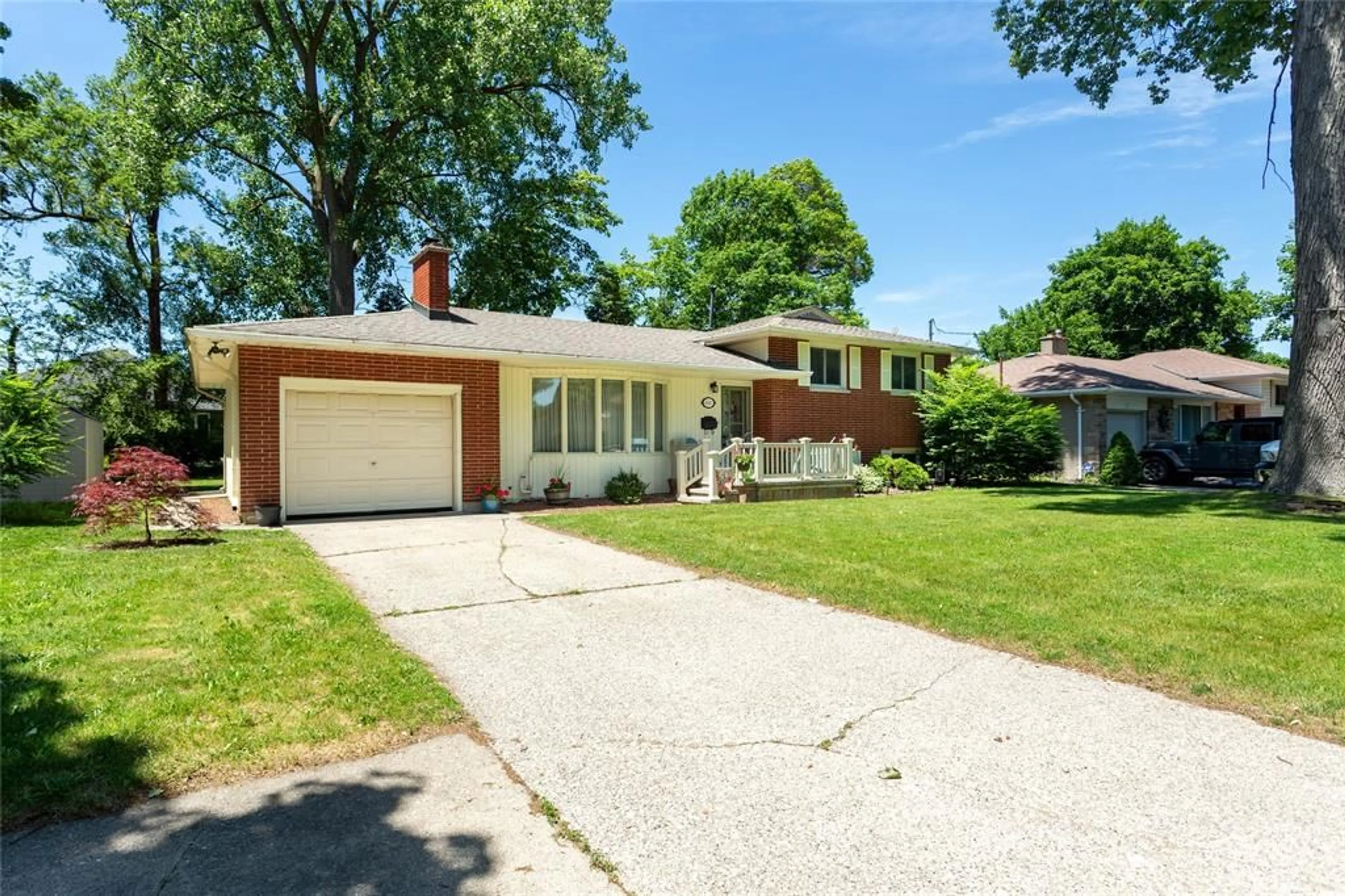 Home with brick exterior material, street for 1067 BEL AIRE Dr, Sarnia Ontario N7S 3H4