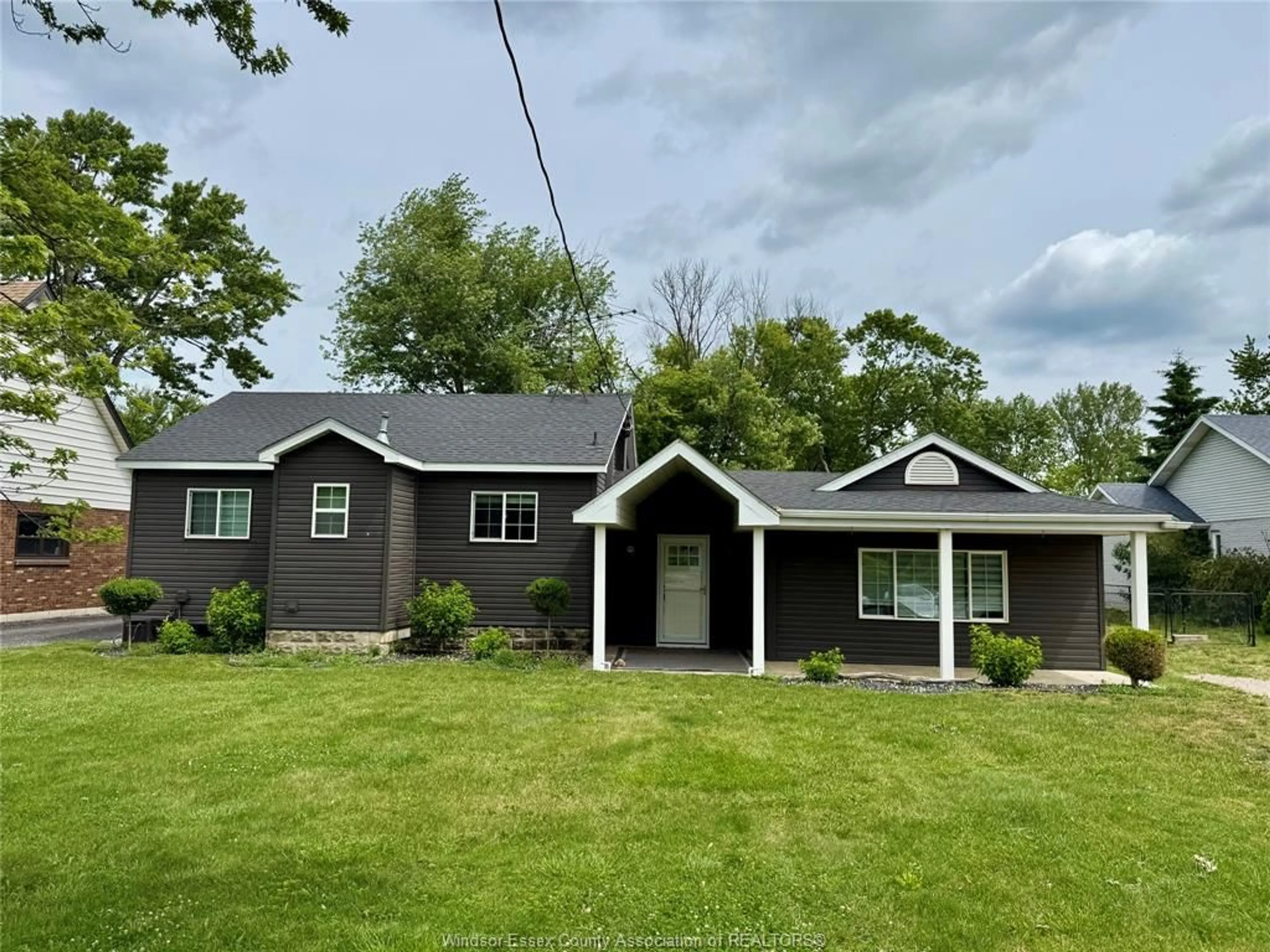 A pic from outside/outdoor area/front of a property/back of a property/a pic from drone, unknown for 1052 COUNTY RD 22, Lakeshore Ontario N8L 0E1