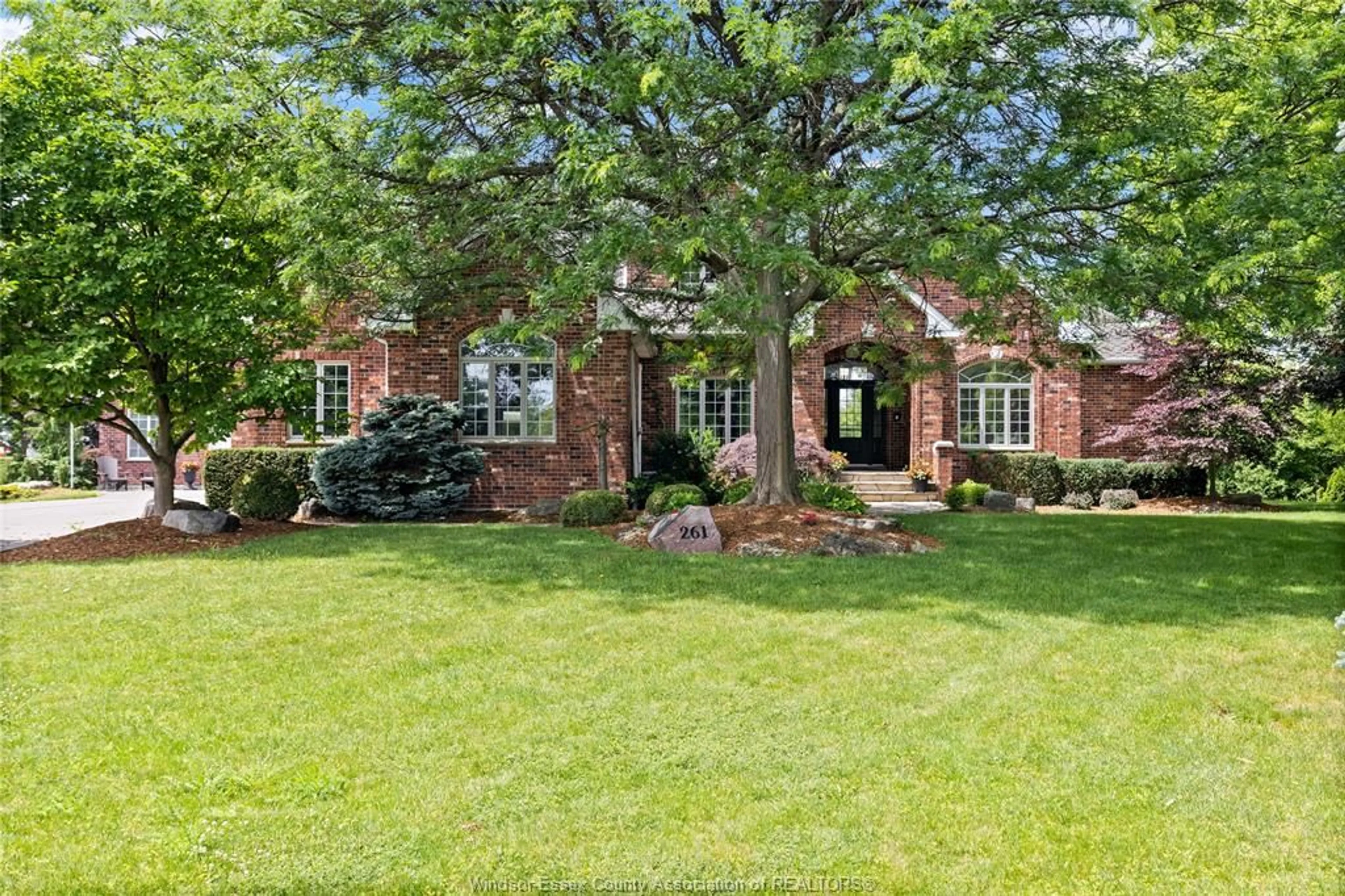 Home with brick exterior material, street for 261 RUGGABER Dr, Lakeshore Ontario N8N 4N8