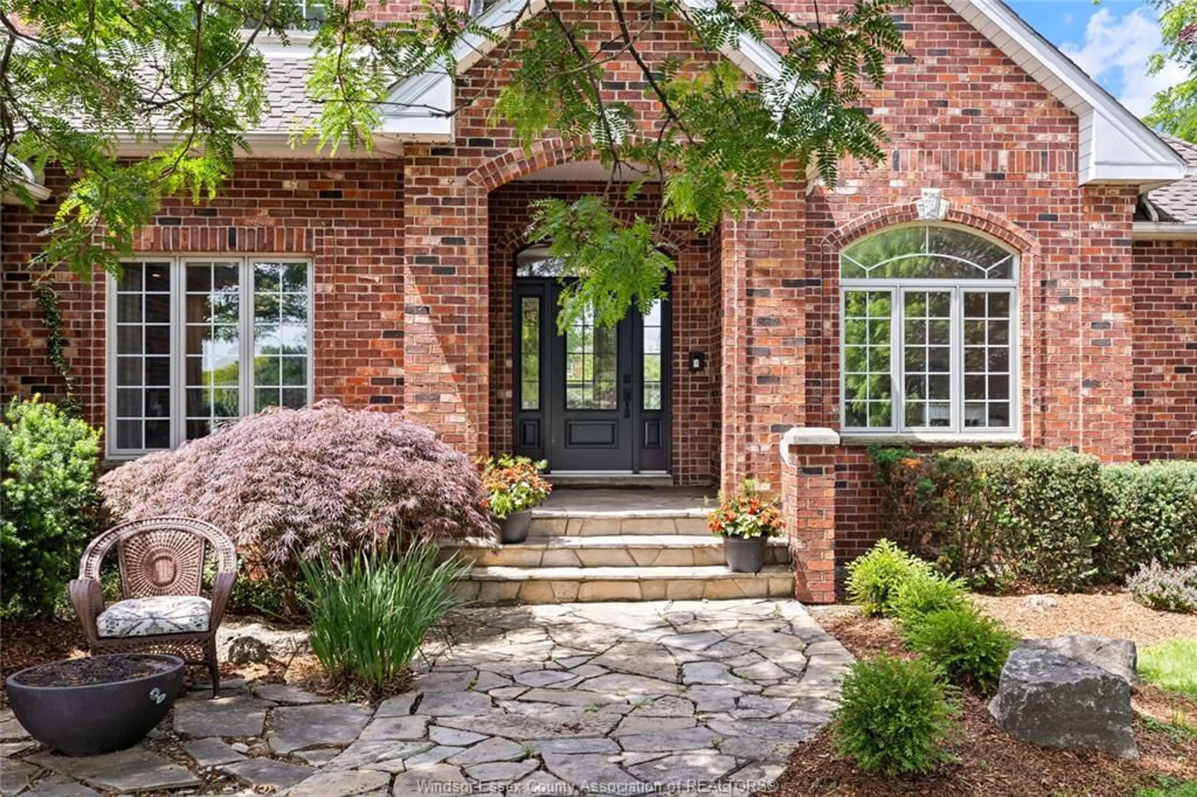 Home with brick exterior material, street for 261 RUGGABER Dr, Lakeshore Ontario N8N 4N8