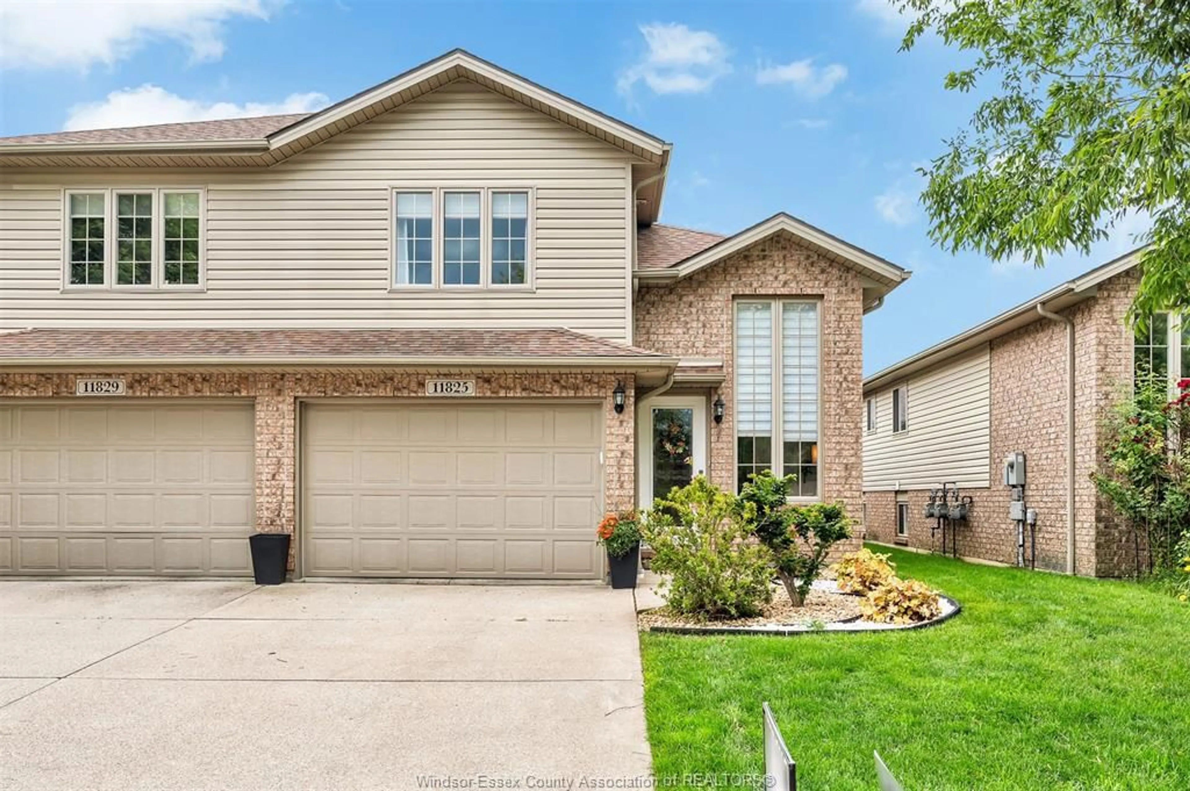 Home with brick exterior material, street for 11825 ROCKLAND, Windsor Ontario N8P 1Z7