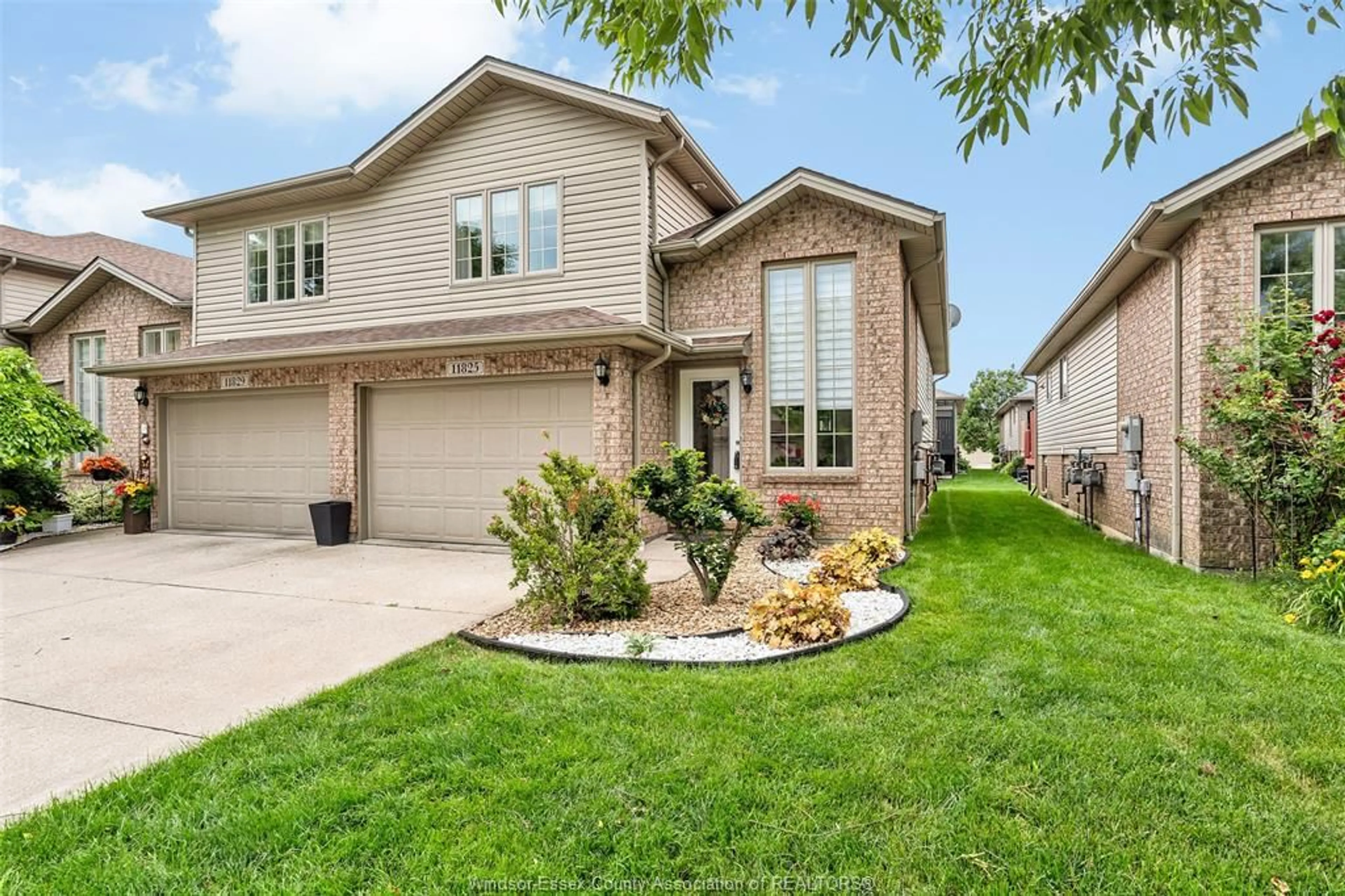 Home with brick exterior material, street for 11825 ROCKLAND, Windsor Ontario N8P 1Z7