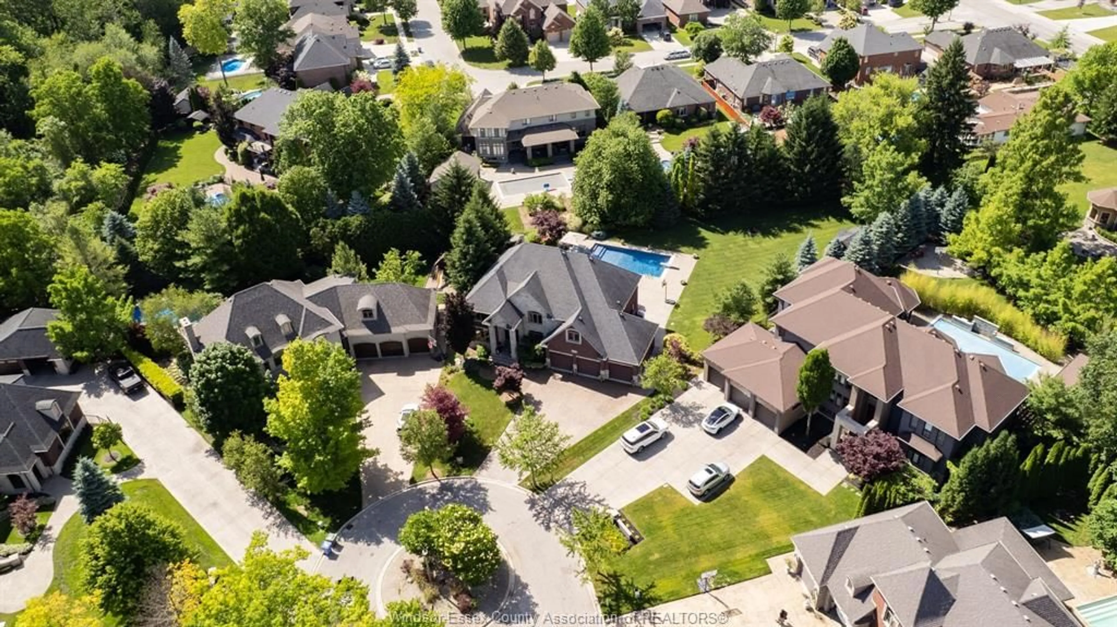 A pic from outside/outdoor area/front of a property/back of a property/a pic from drone, street for 1339 TUSCANY OAKS Dr, LaSalle Ontario N9J 0B6