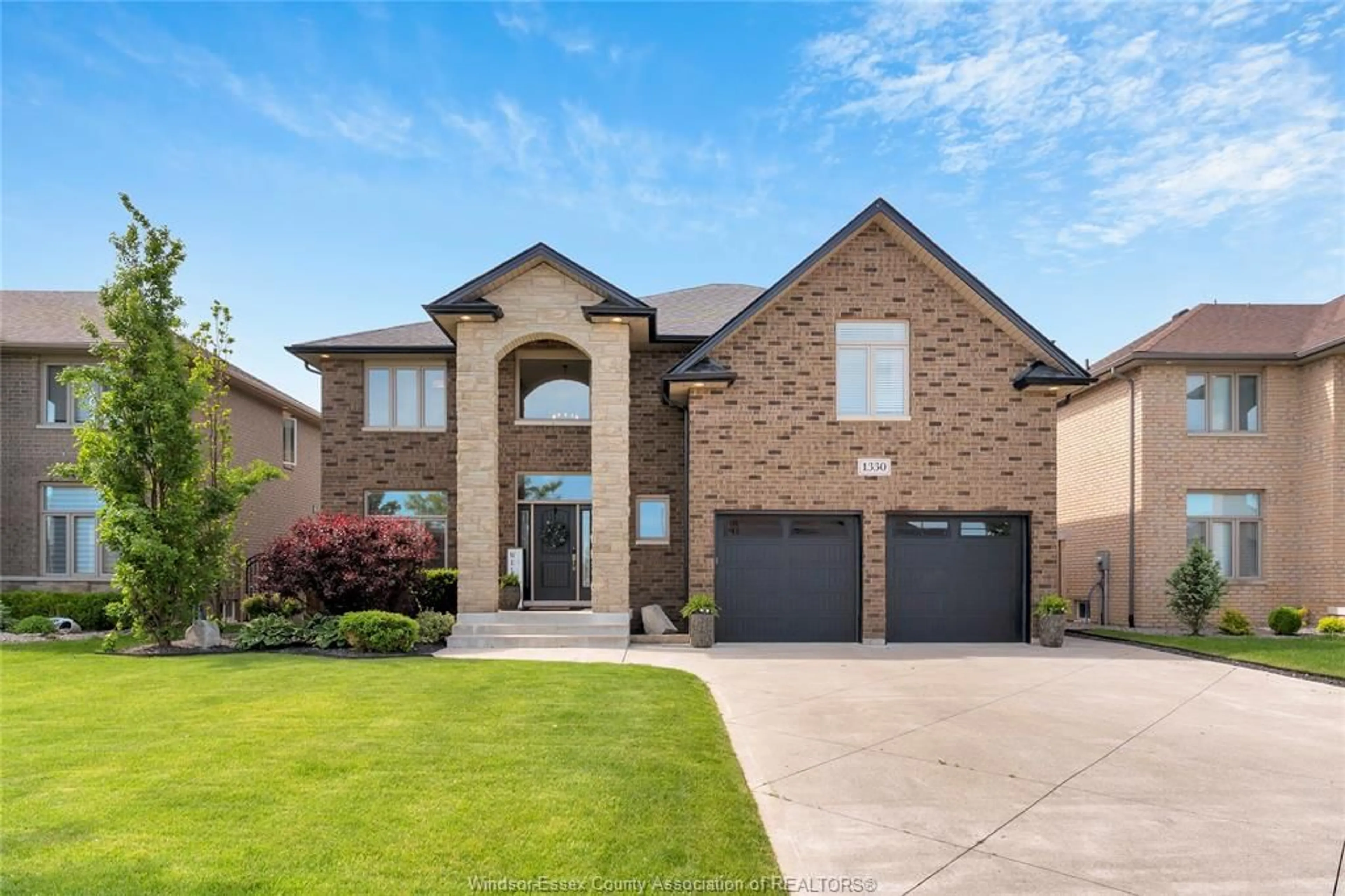 Home with brick exterior material, street for 1330 DEER RUN Trail, Lakeshore Ontario N0R 1A0