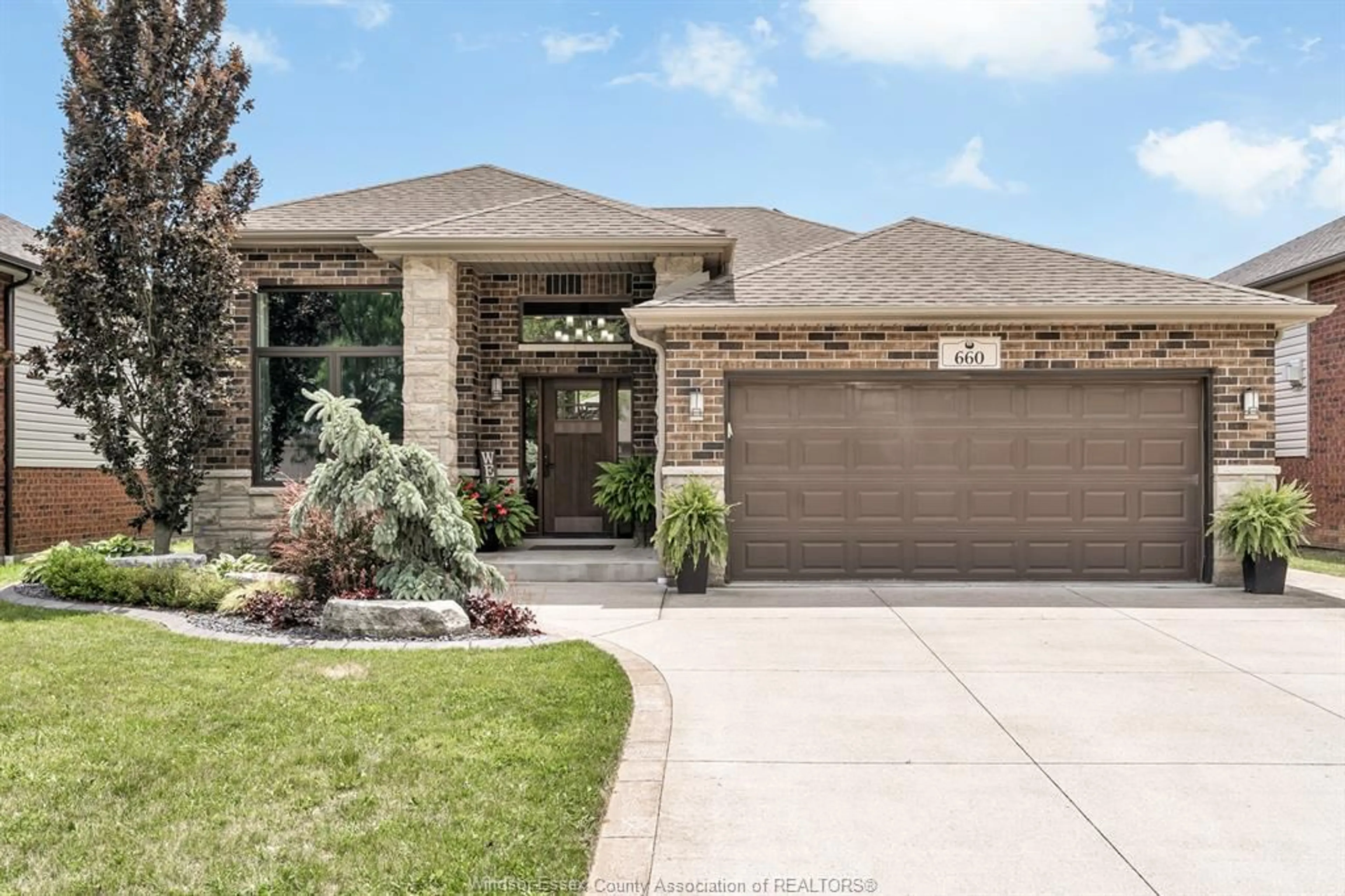 Home with brick exterior material, street for 660 INTERNATIONAL Ave, LaSalle Ontario N9J 0A5